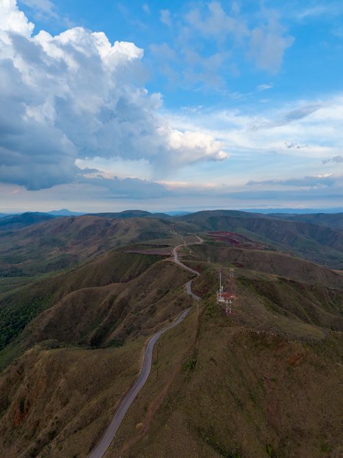 Free Aerial view of scenic mountain landscape near Belo Horizonte, Minas Gerais, Brazil, with dramatic clouds overhead. Stock Photo