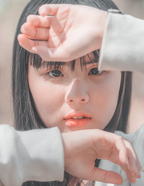 Woman Wearing White Sweater