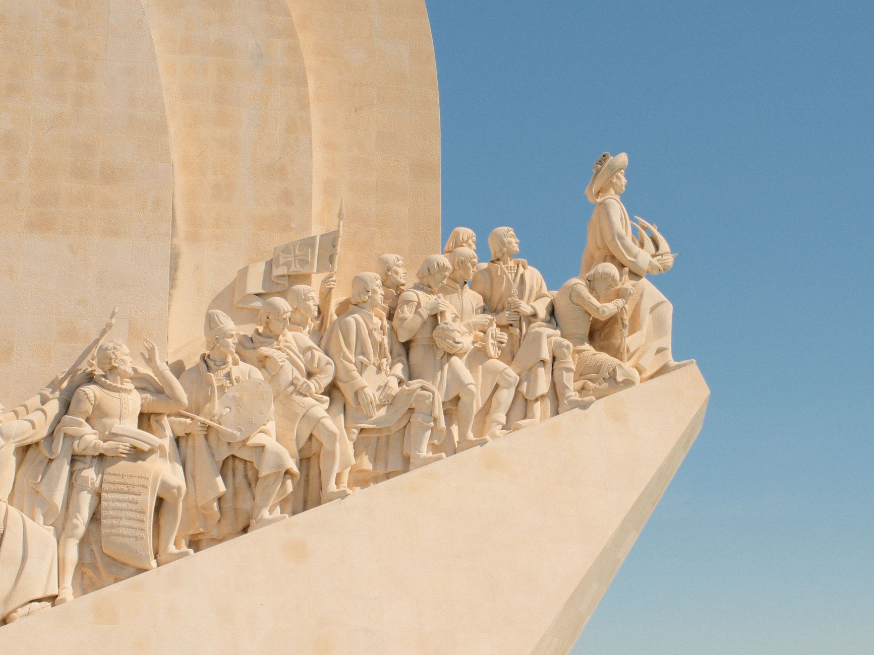 Explore the historic Padrao dos Descobrimentos monument in Lisbon, Portugal, under a clear blue sky.