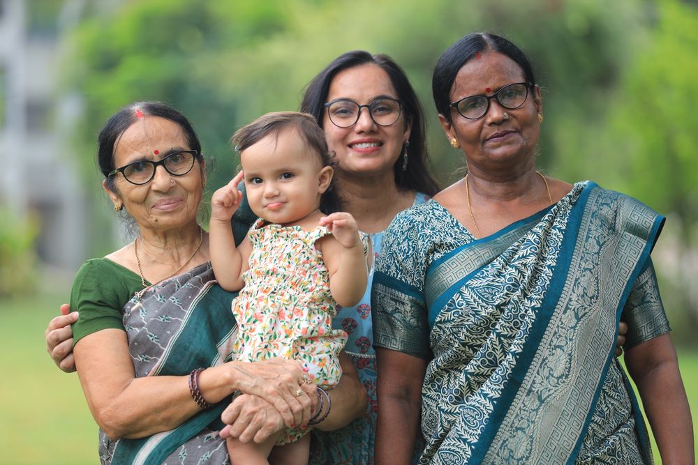 Four generations of a family together outdoors