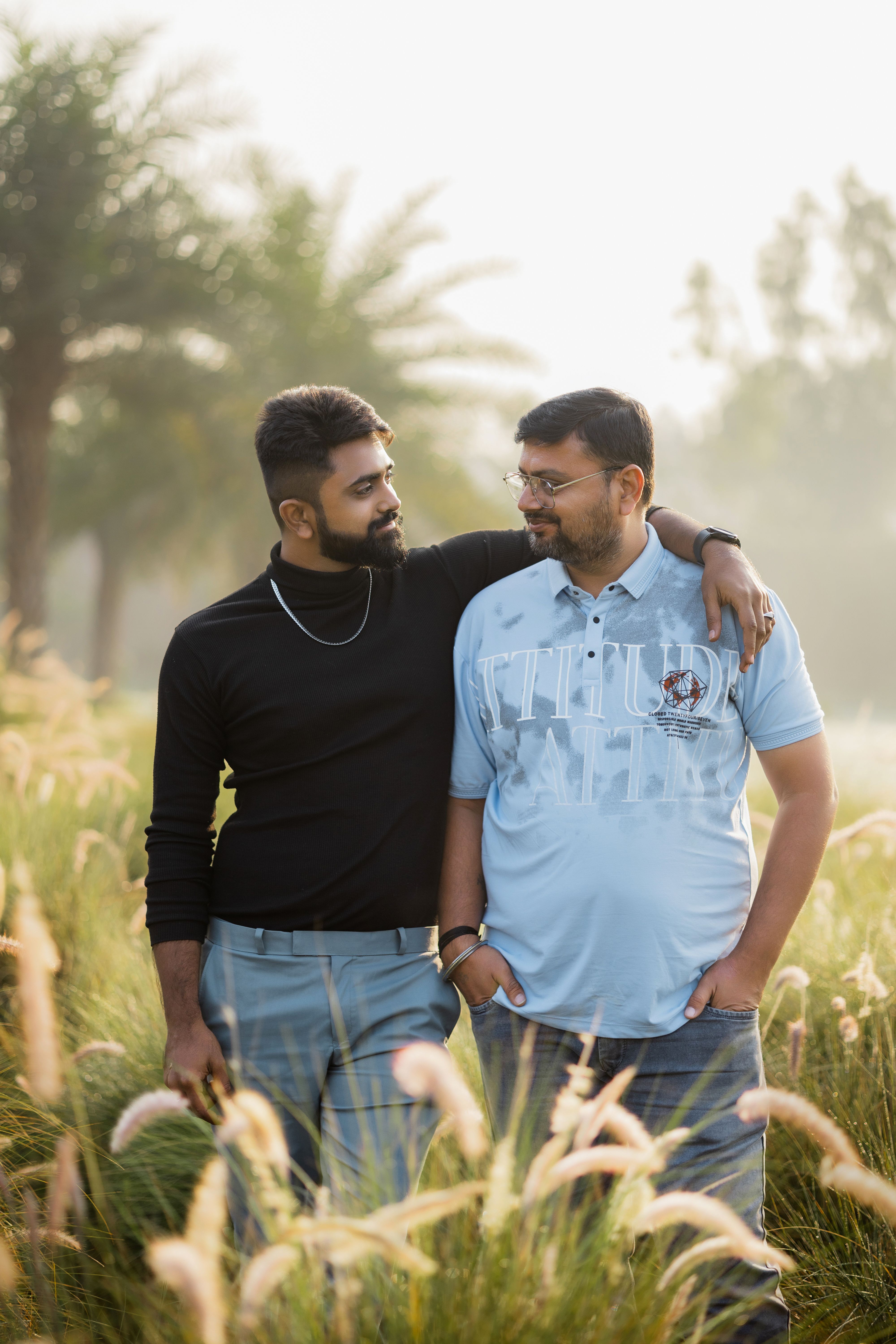 Two Men Enjoying a Stroll in Nature · Free Stock Photo