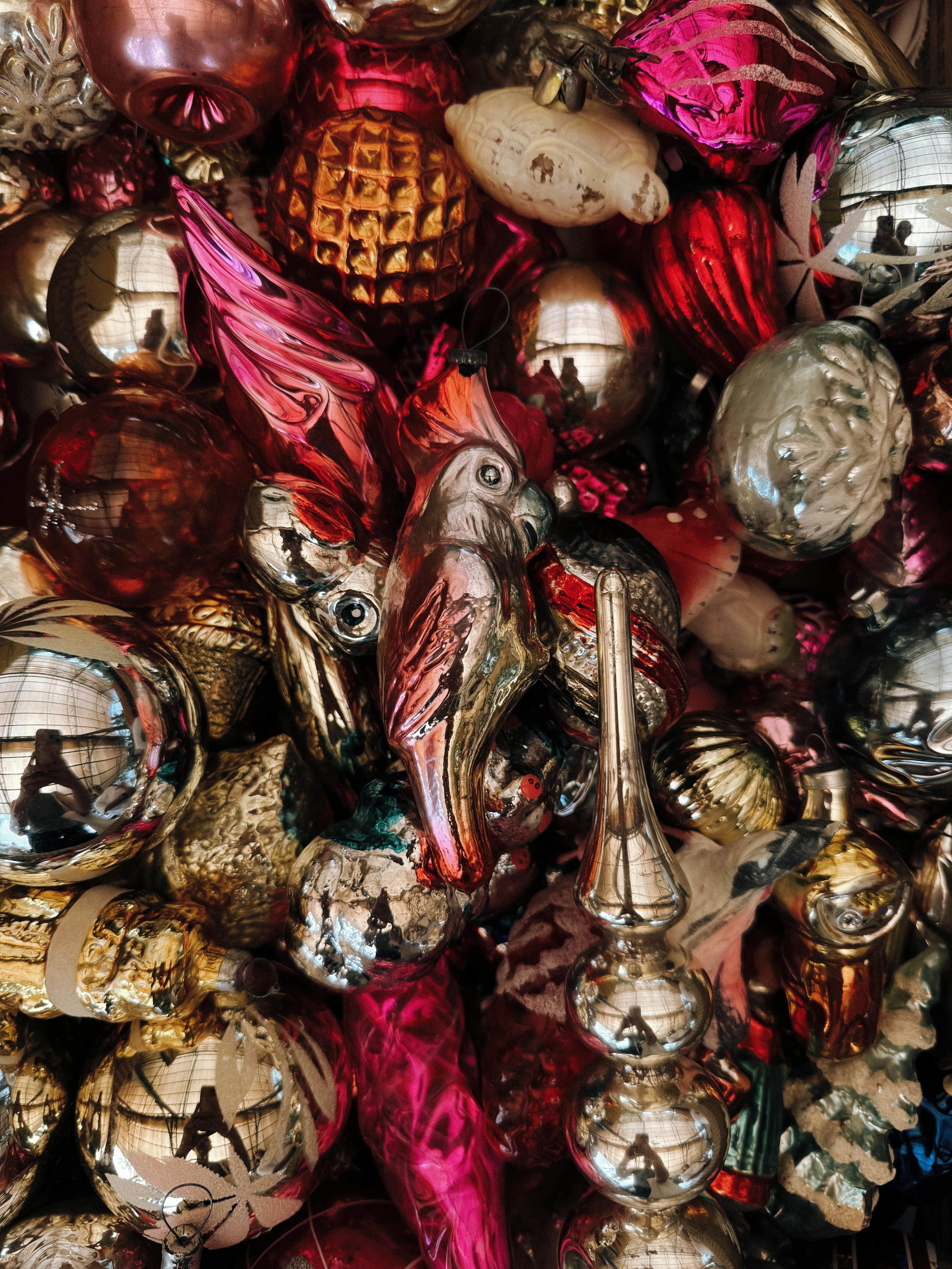 A colorful mix of vintage Christmas ornaments creating a festive vibe.