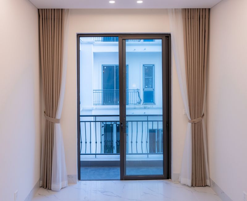 Close-up of a sliding glass door showcasing energy-efficient features