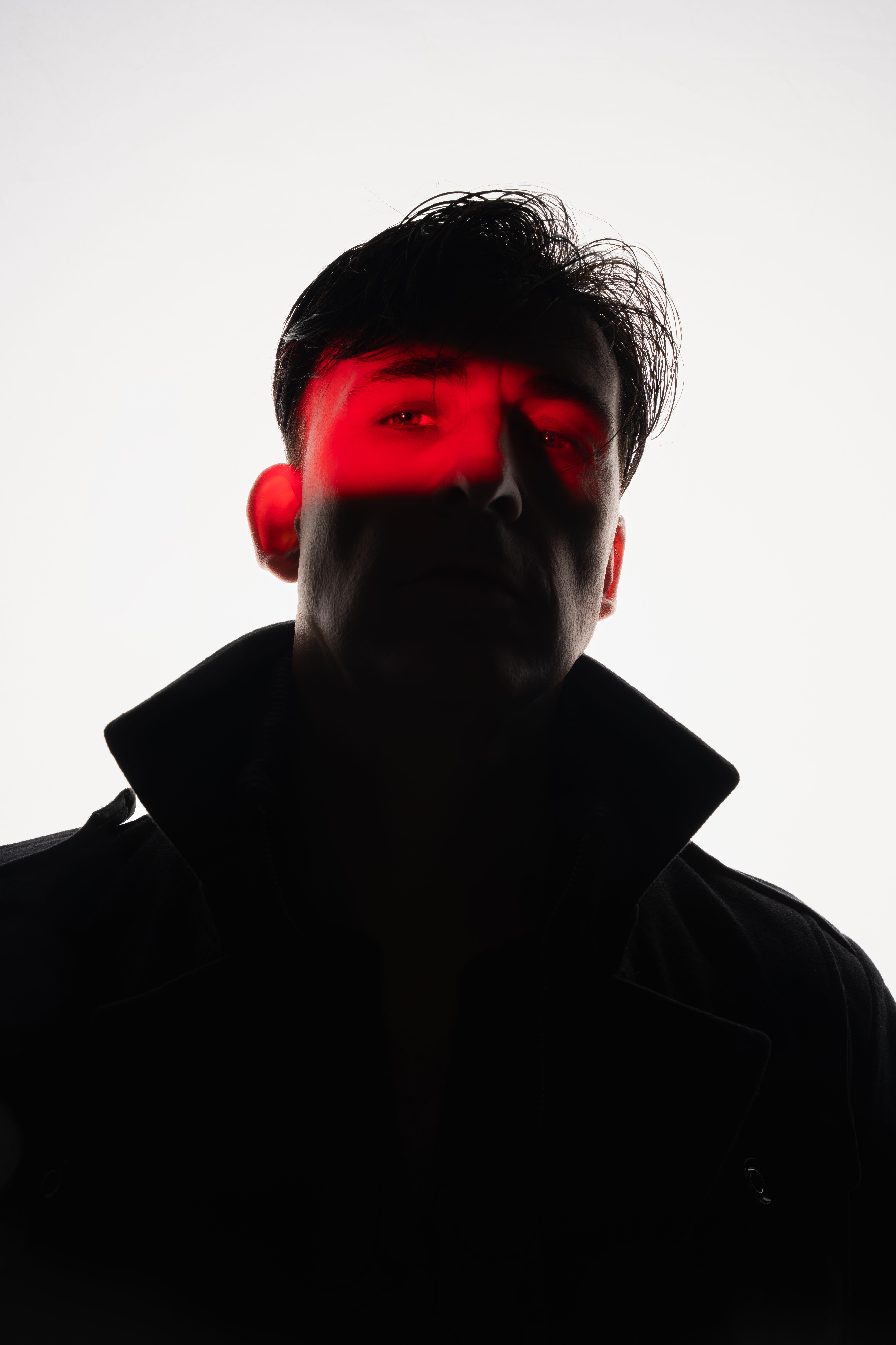 Dramatic Male Portrait with Red Lighting · Free Stock Photo