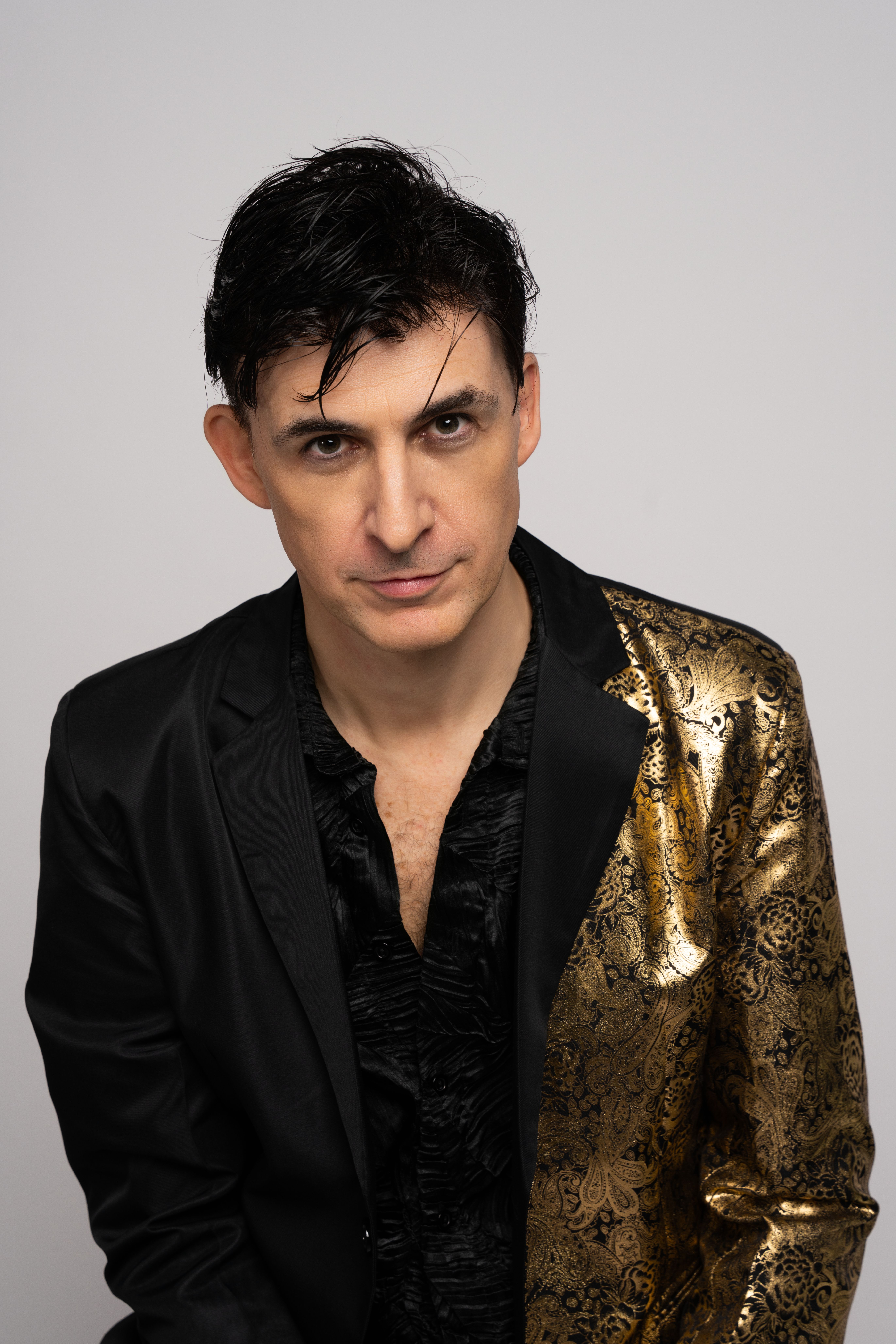 Stylish Portrait of a Man in Gold Jacket · Free Stock Photo