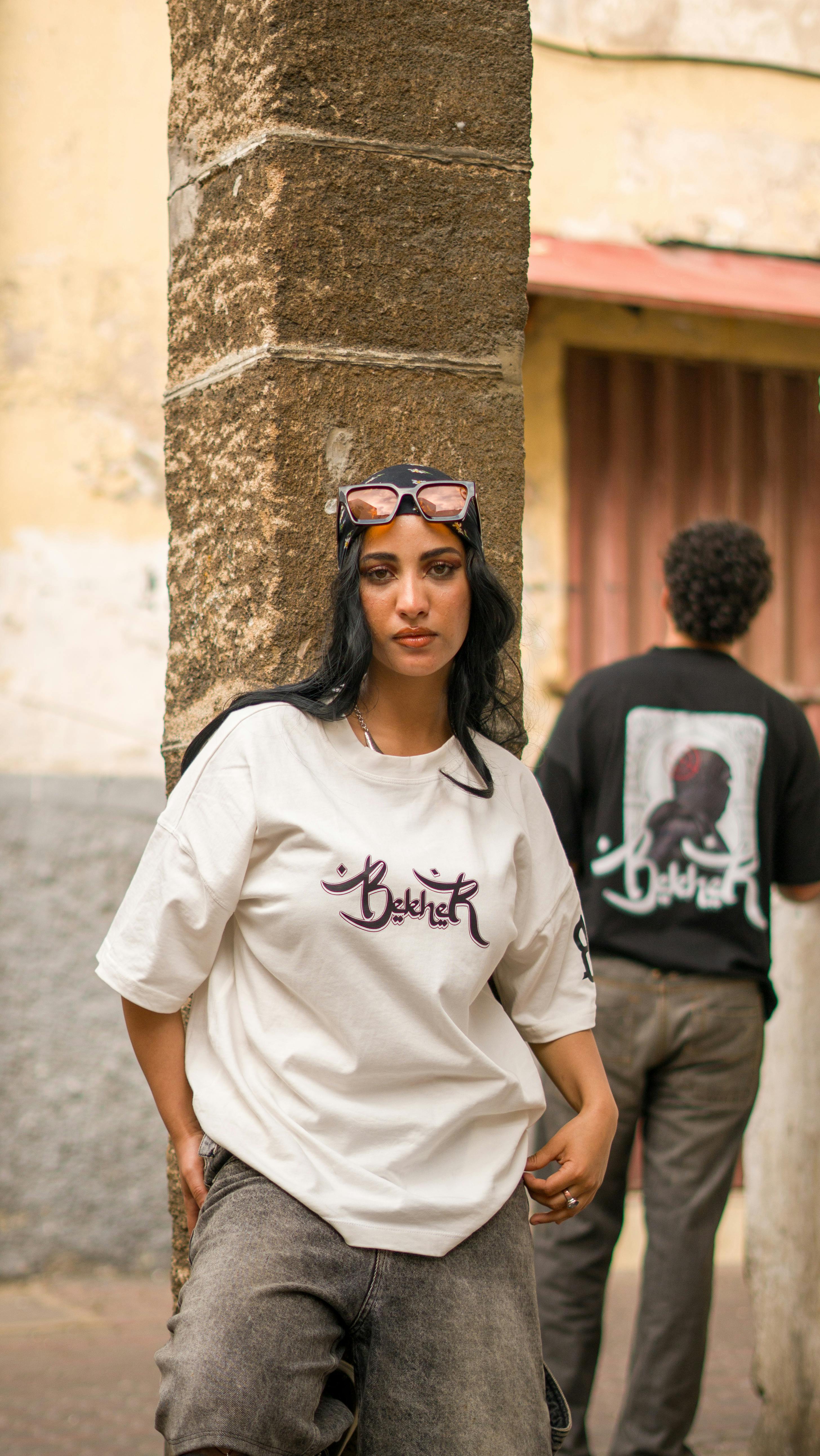 White Graphic Tee Gray Wide-Leg Jeans Pink Sunglasses