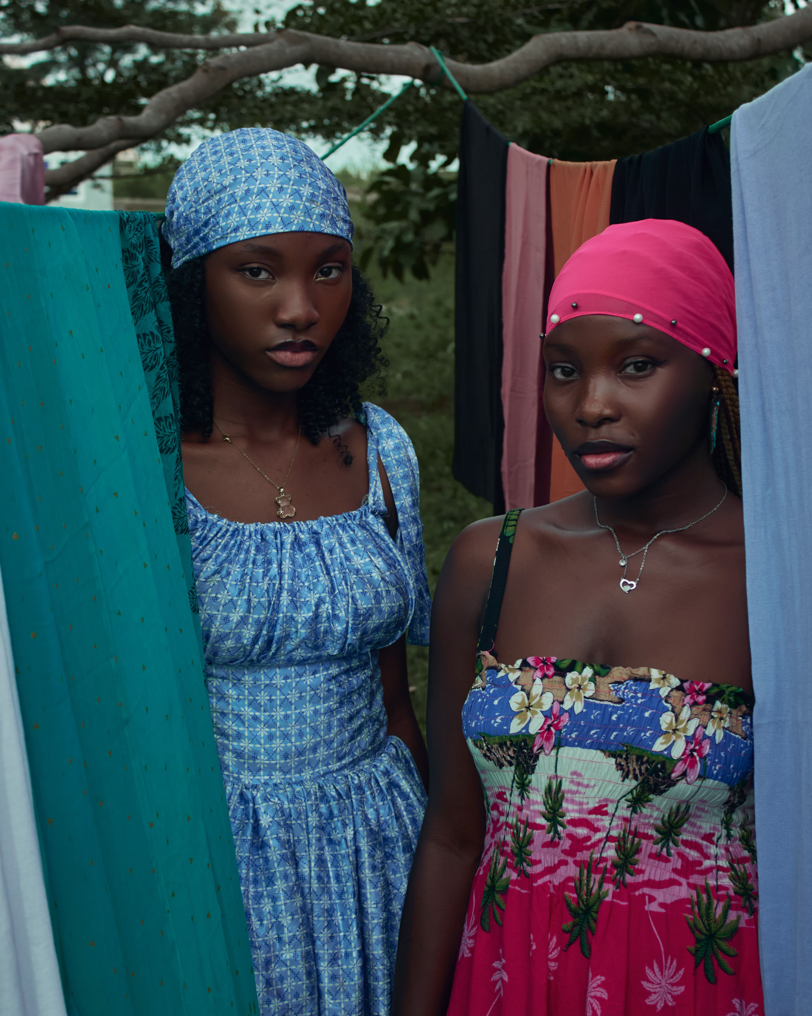 Two Women in Colorful Dresses Outdoors · Free Stock Photo