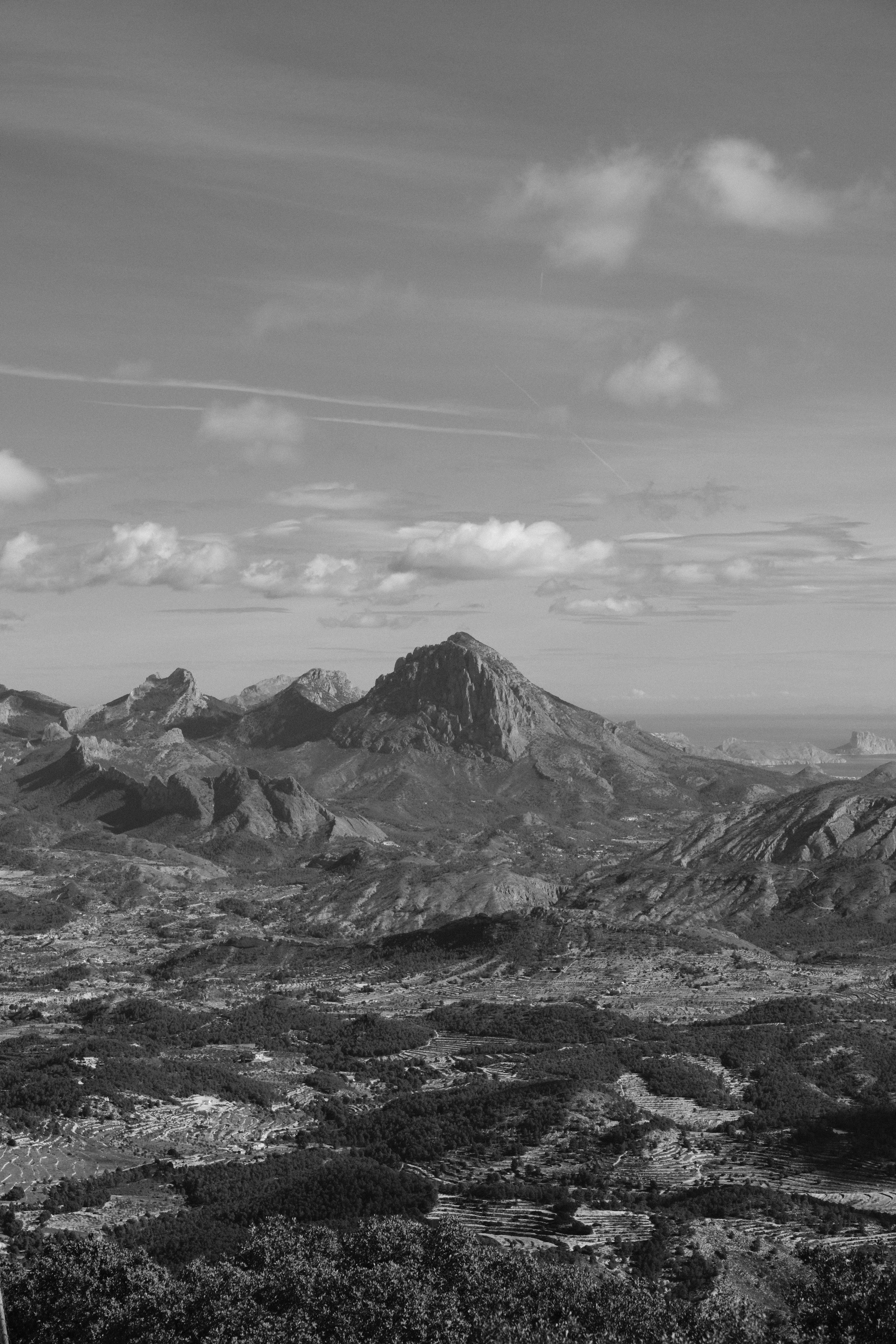 Monochrome view of a rugged mountain landscape in Alicante, Spain.