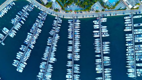 Free Stunning aerial shot of Bodrum Marina showcasing an array of docked yachts against the tranquil waters. Stock Photo