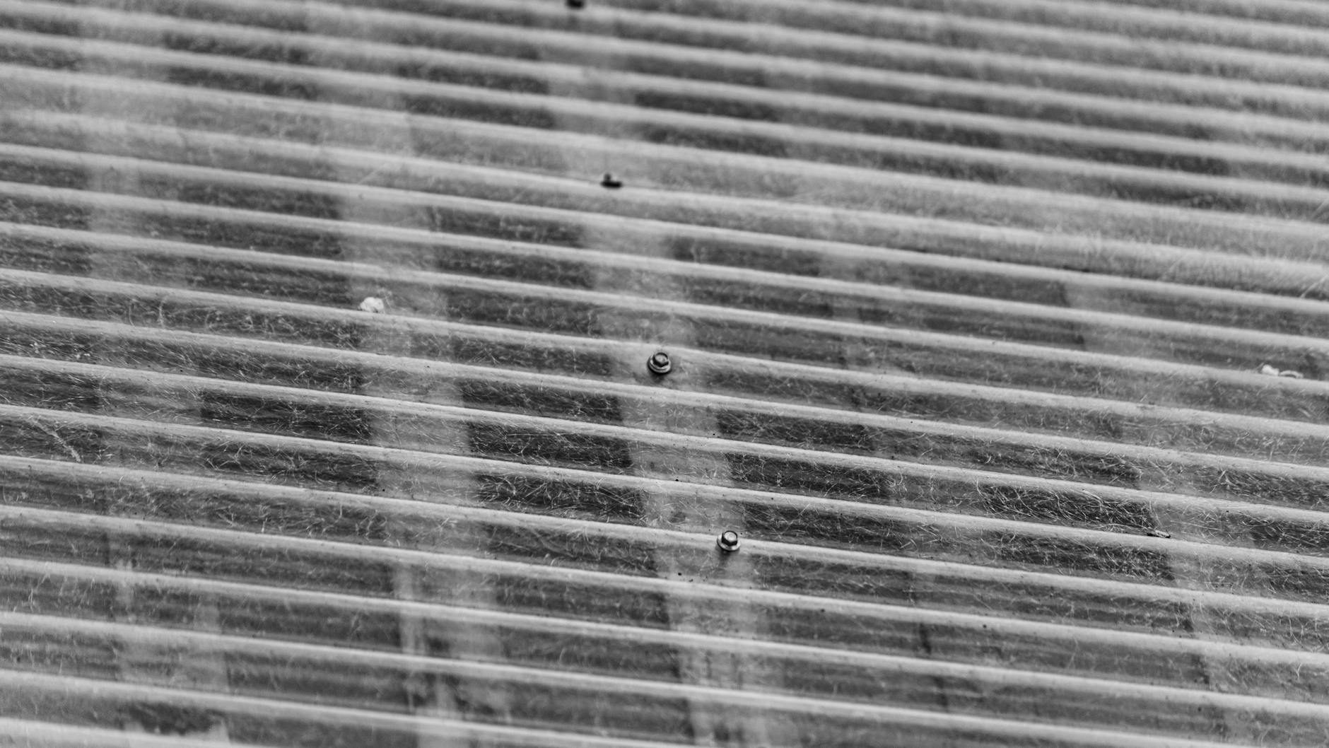 Corrugated metal roof with exposed screws