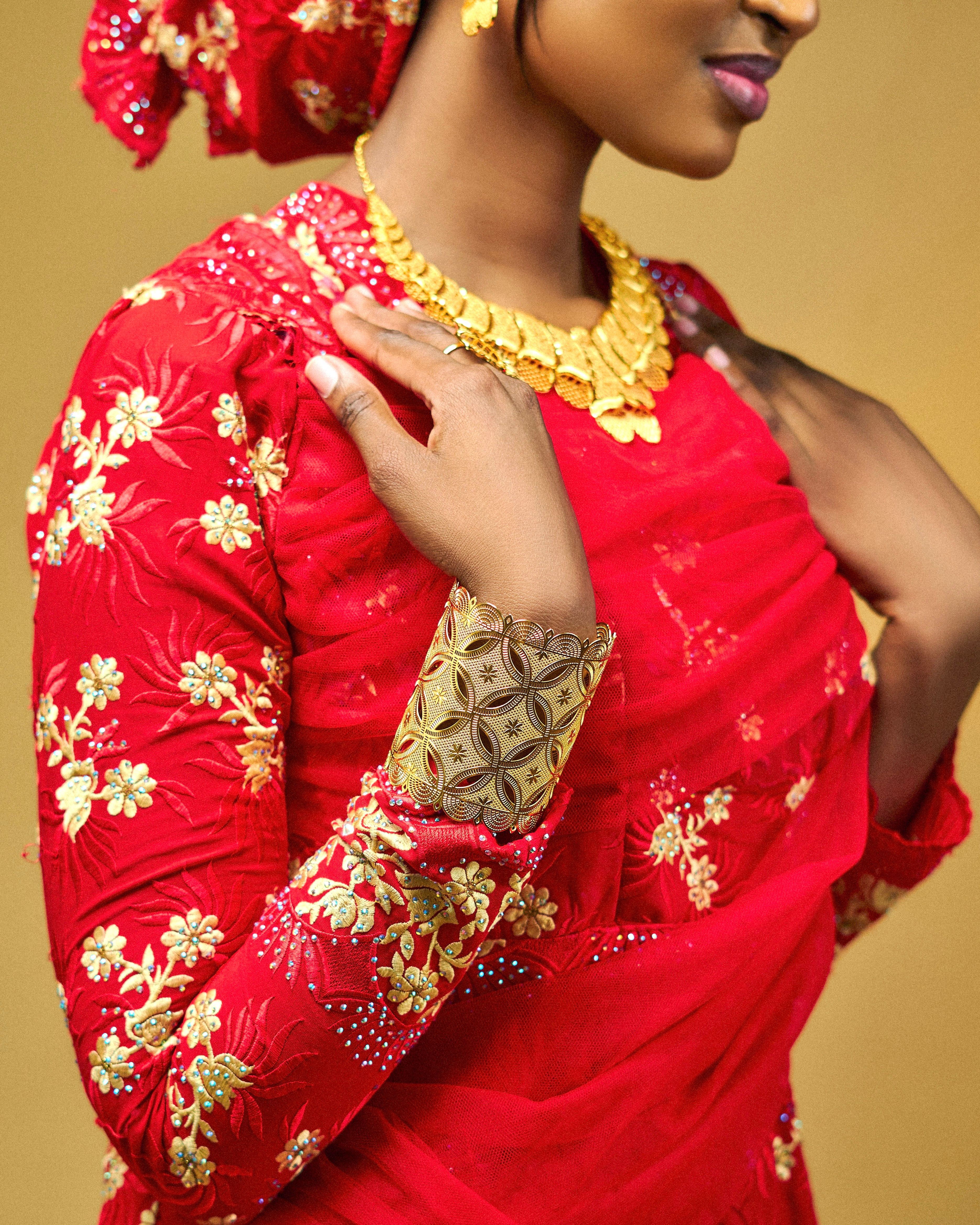 Elegant Portrait of Woman in Traditional Red Attire · Free Stock Photo