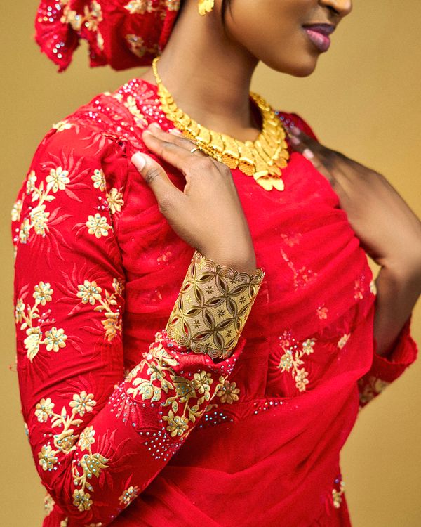 Elegant Portrait of Woman in Traditional Red Attire · Free Stock Photo