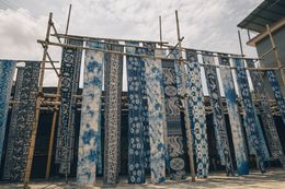Indigo-dyed cloth drying outdoors — photo by Trần Phan Phạm Lê on Pexels