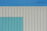 Modern Minimalist Building Facade with Blue Accents