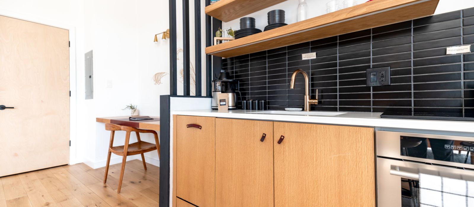 Minimalist kitchen with timber cabinetry