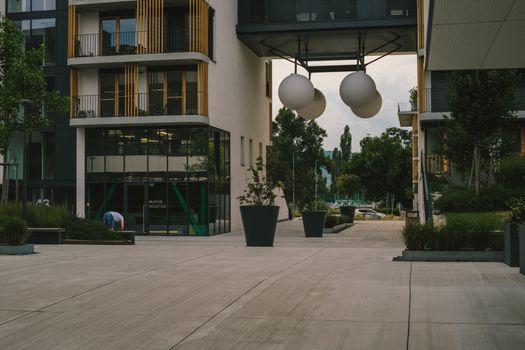 Street view of modern architecture in Bratislava, featuring contemporary buildings and urban design elements.