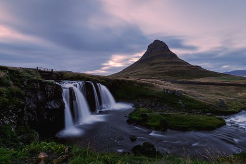 Free Stunning view of Kirkjufell Mountain and waterfall at twilight in Iceland, captured with long exposure. Stock Photo
