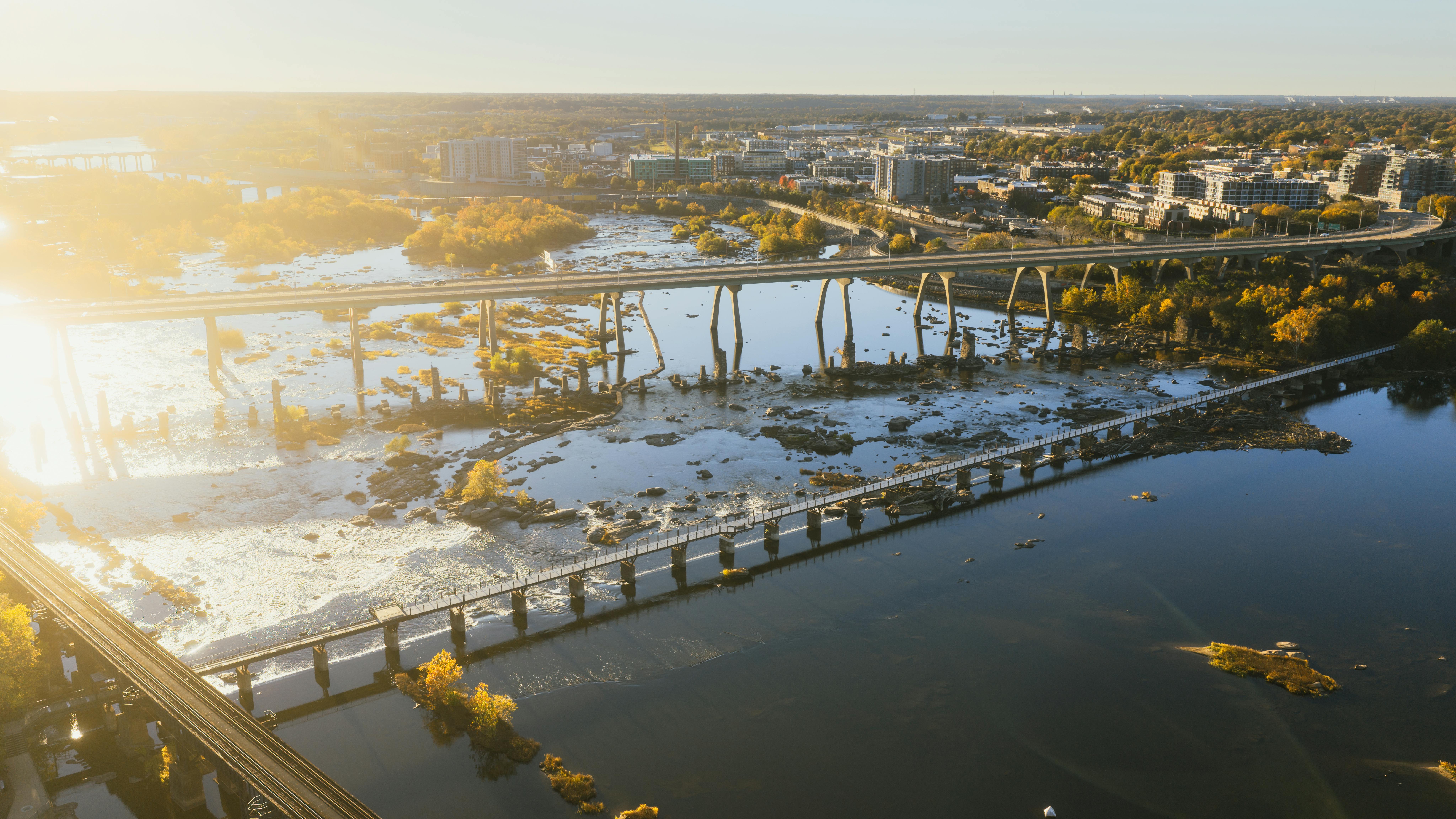 Stunning aerial view of Richmond, Virginia with James River and sunset lighting.