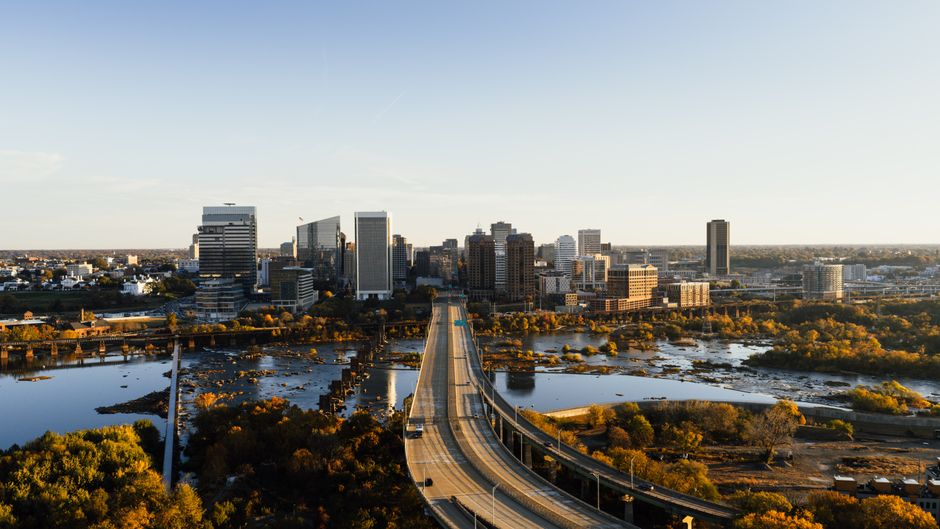 Stunning aerial view of Richmond, Virginia, showcasing the skyline and James River during the day.