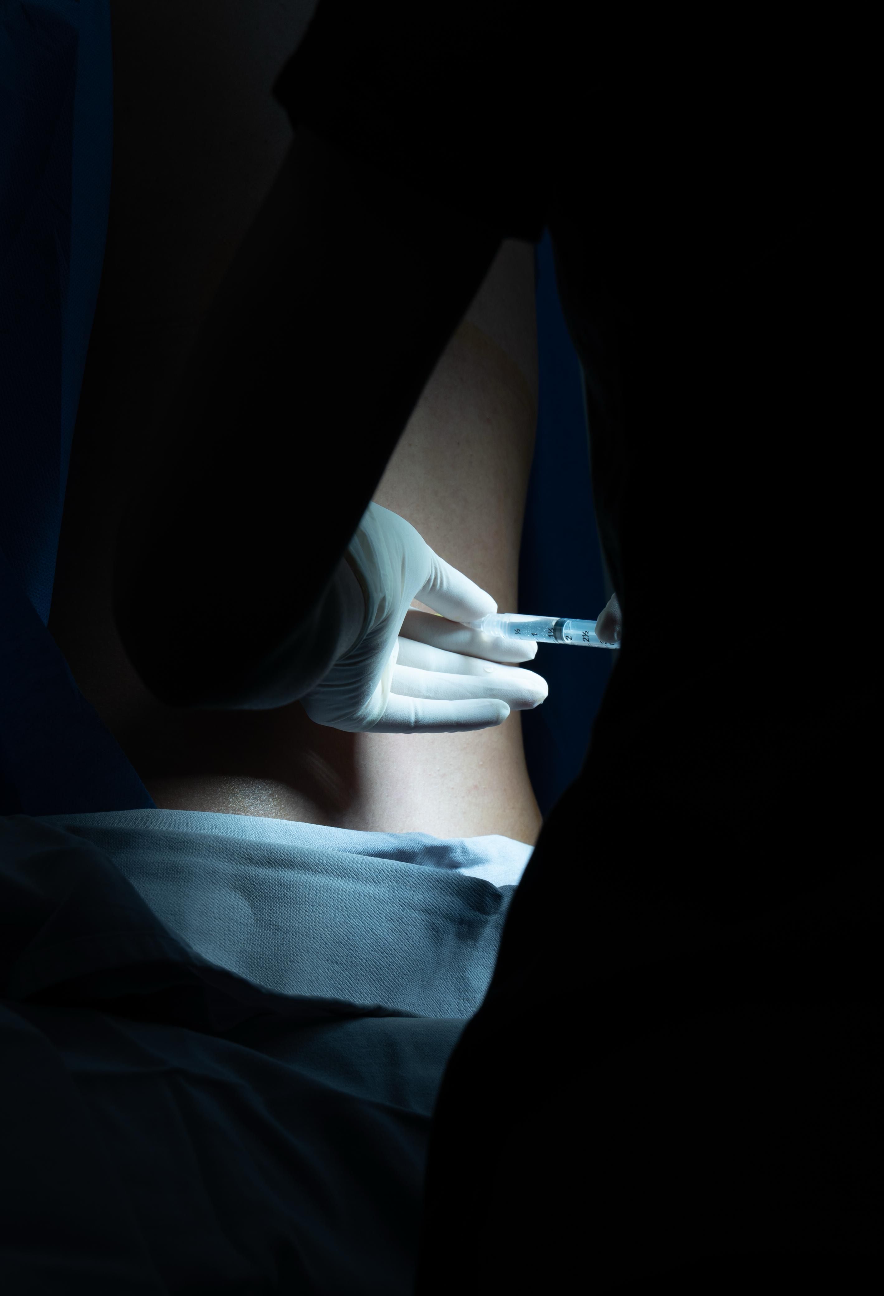 Healthcare Professional Administering Injection · Free Stock Photo