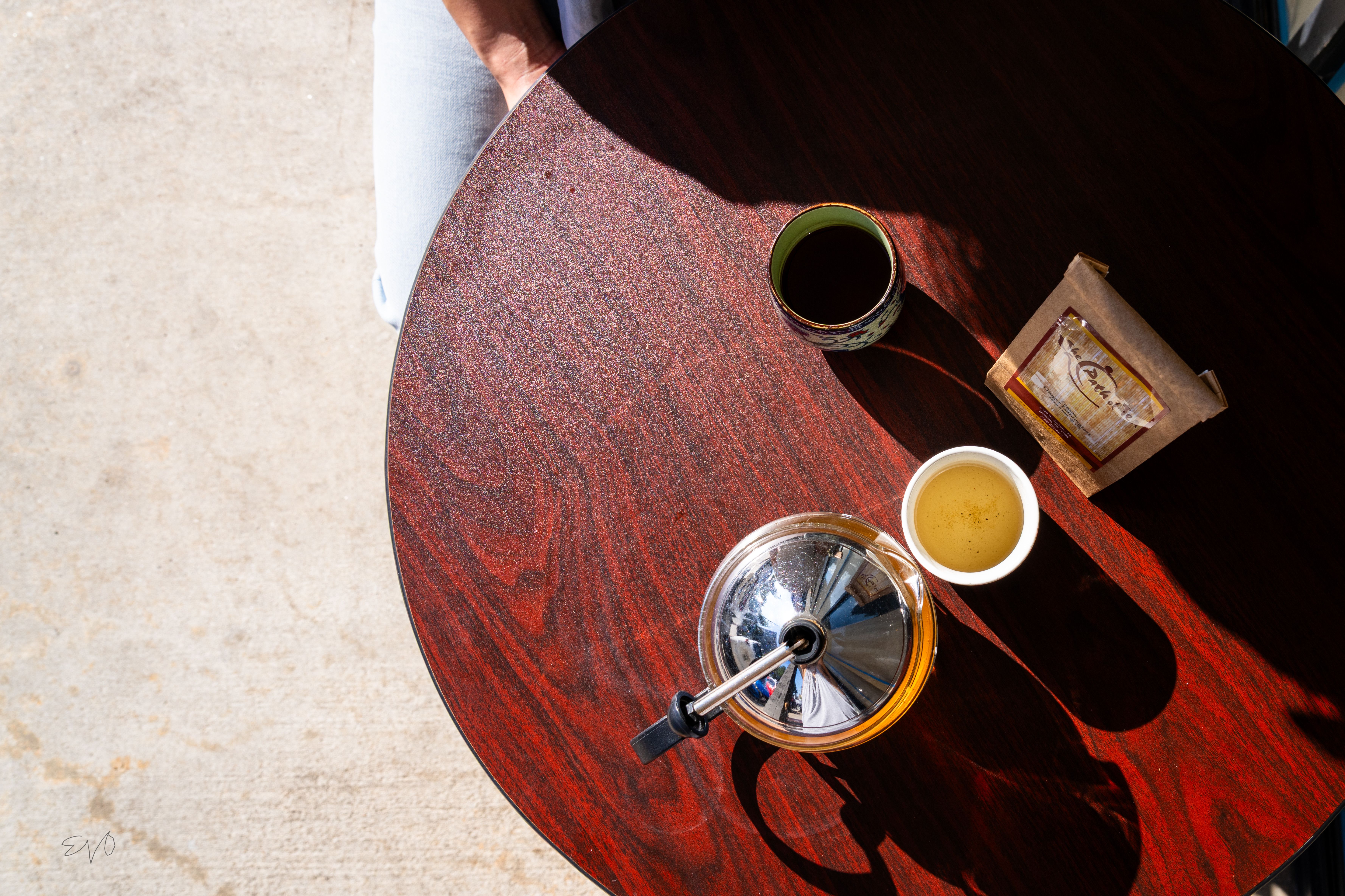 A traditional Egyptian 'ahwa' (coffee shop) with mint tea and coffee being served.