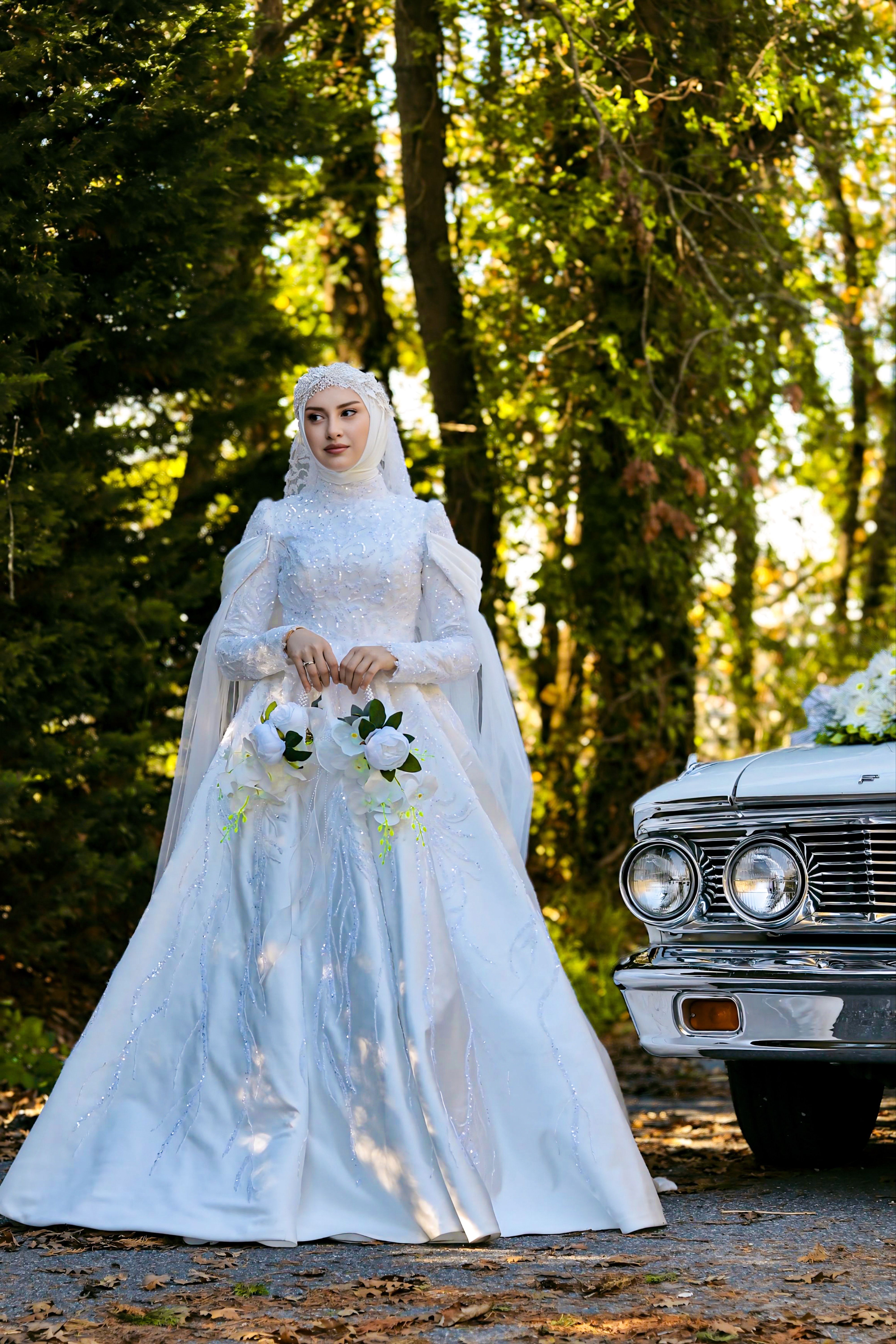 Elegant Bride with Vintage Car in Forest Setting