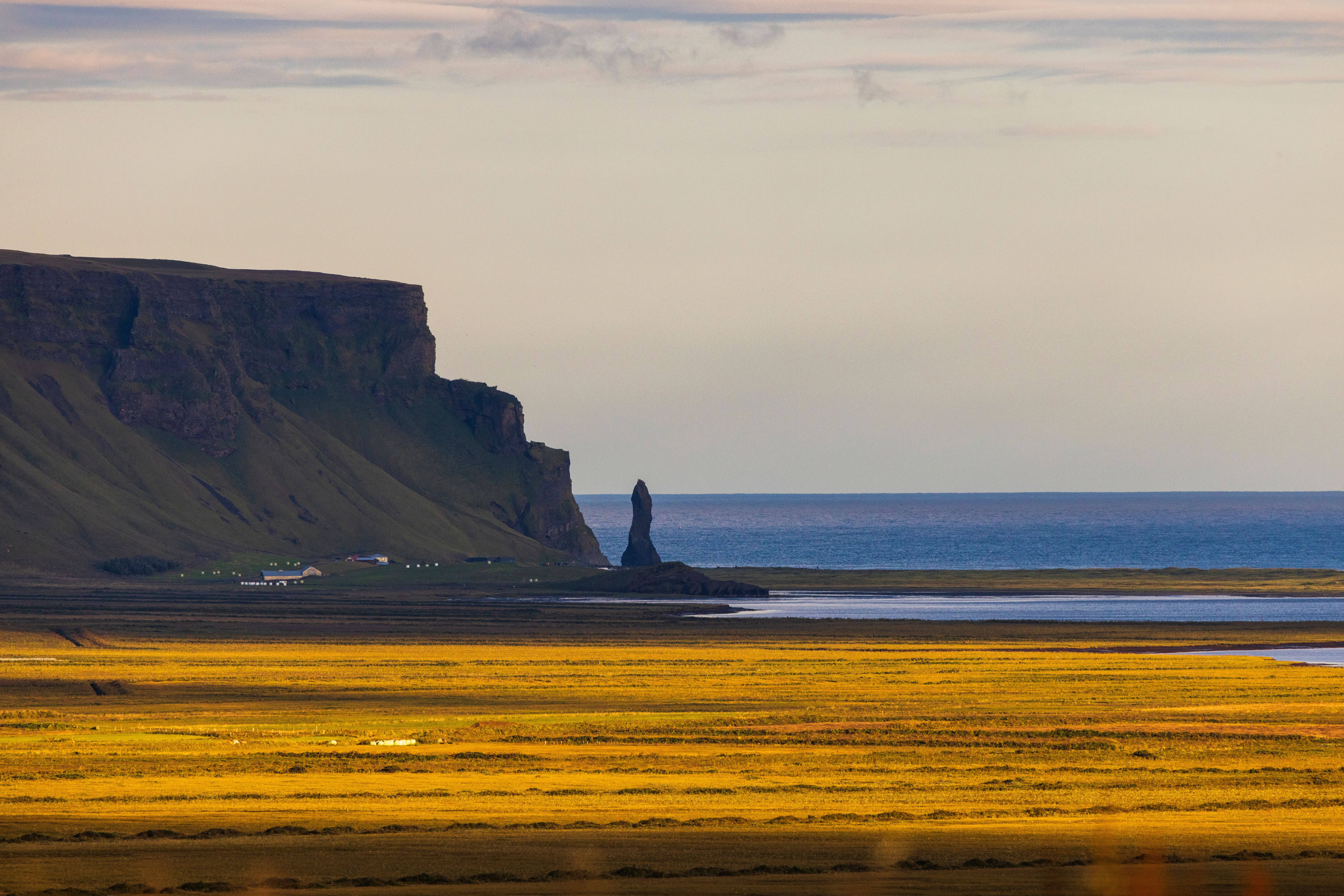Bright midnight sun illuminating Iceland's landscape during July