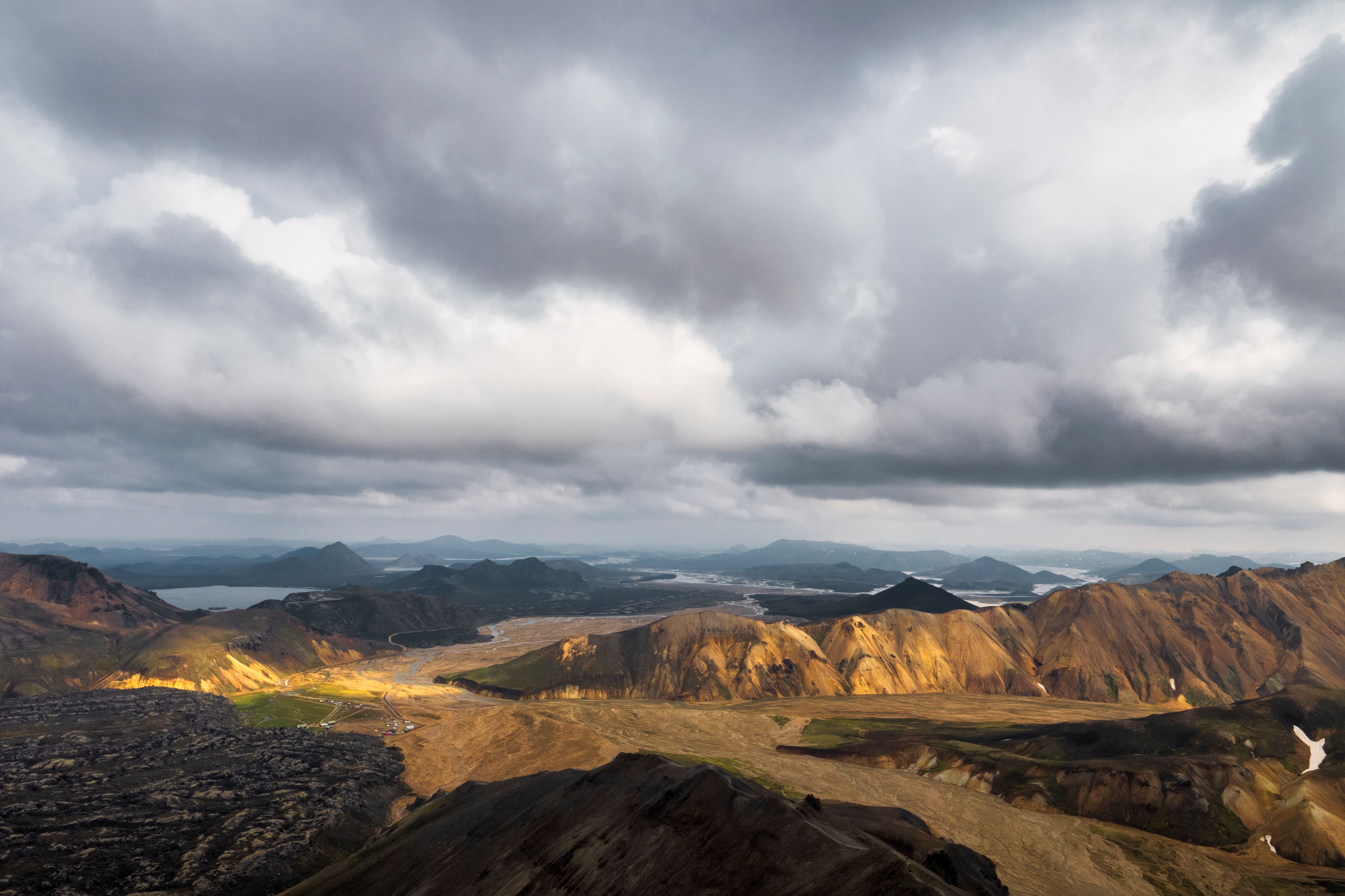 Hiker preparing for weather in Iceland's Highlands