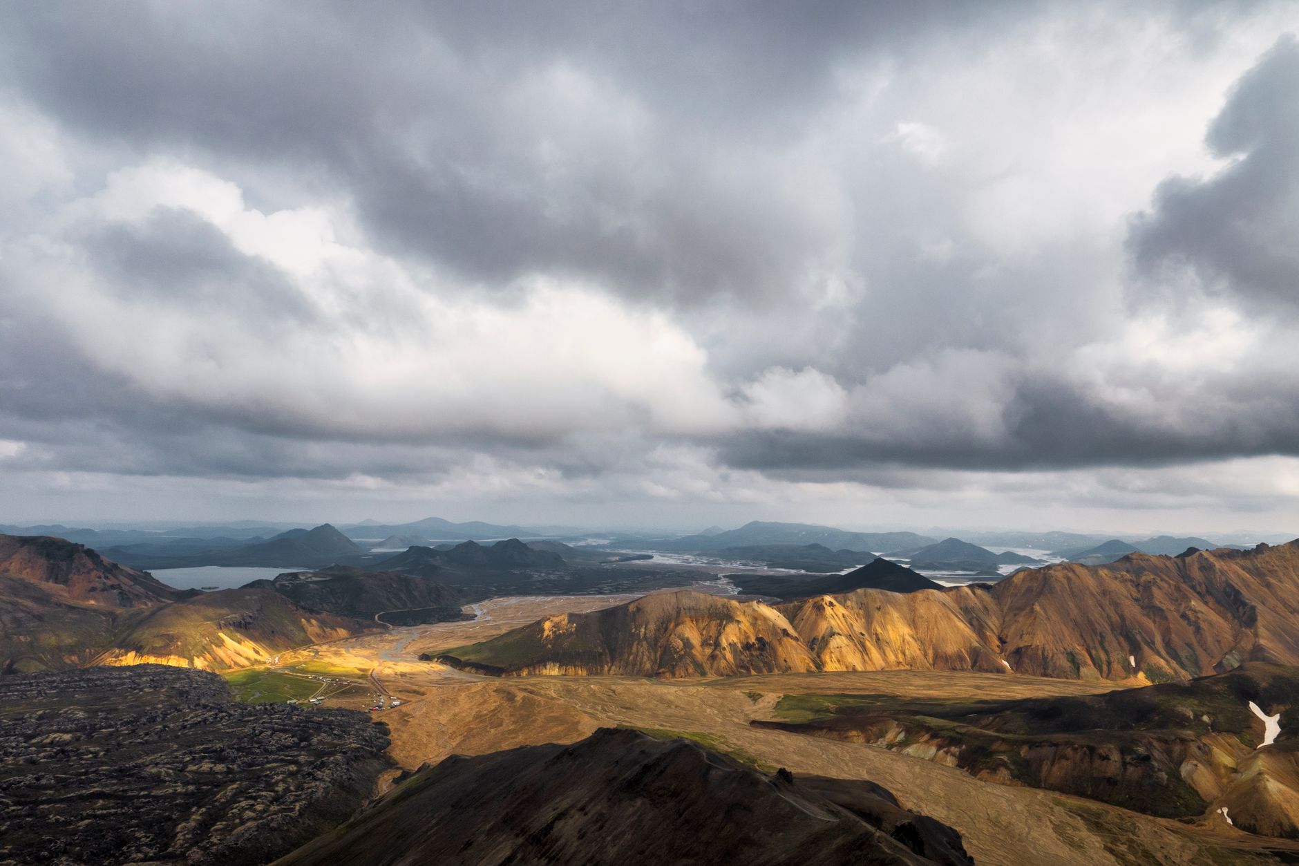 Hiker preparing for weather in Iceland's Highlands
