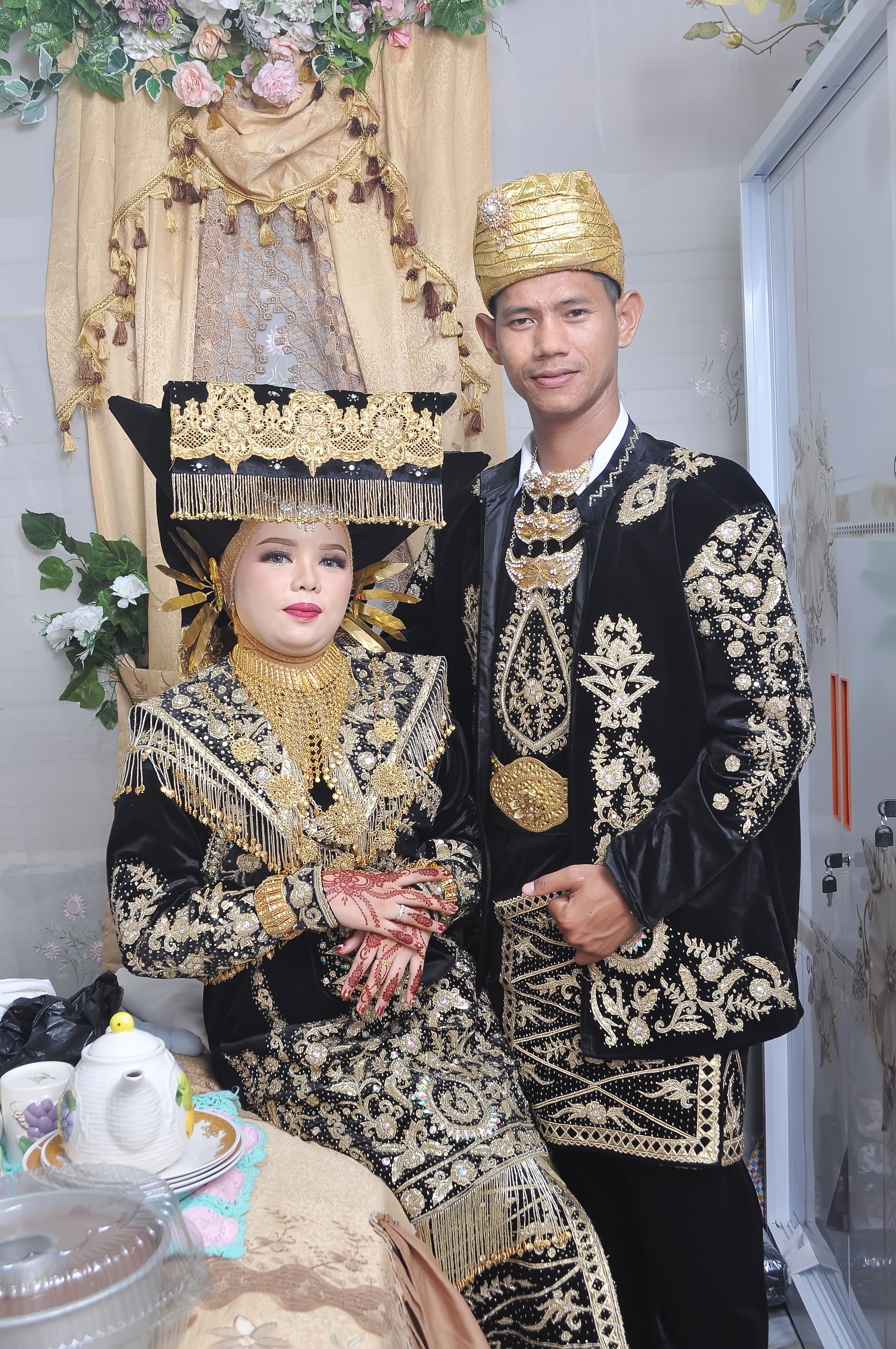 Traditional Wedding Attire of Indonesian Couple · Free Stock Photo