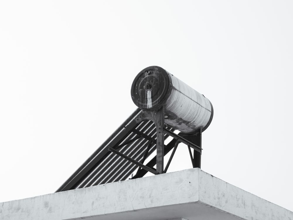 Solar water heater tank on a rooftop