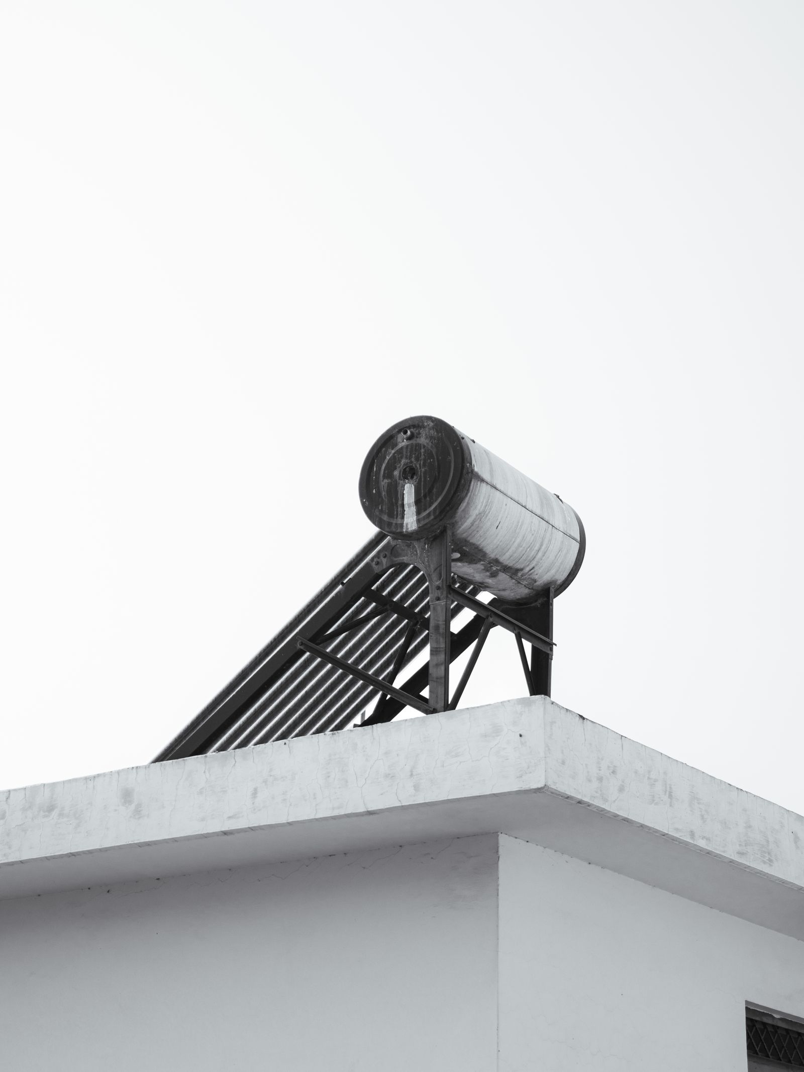 Solar water heating system installed on a rooftop