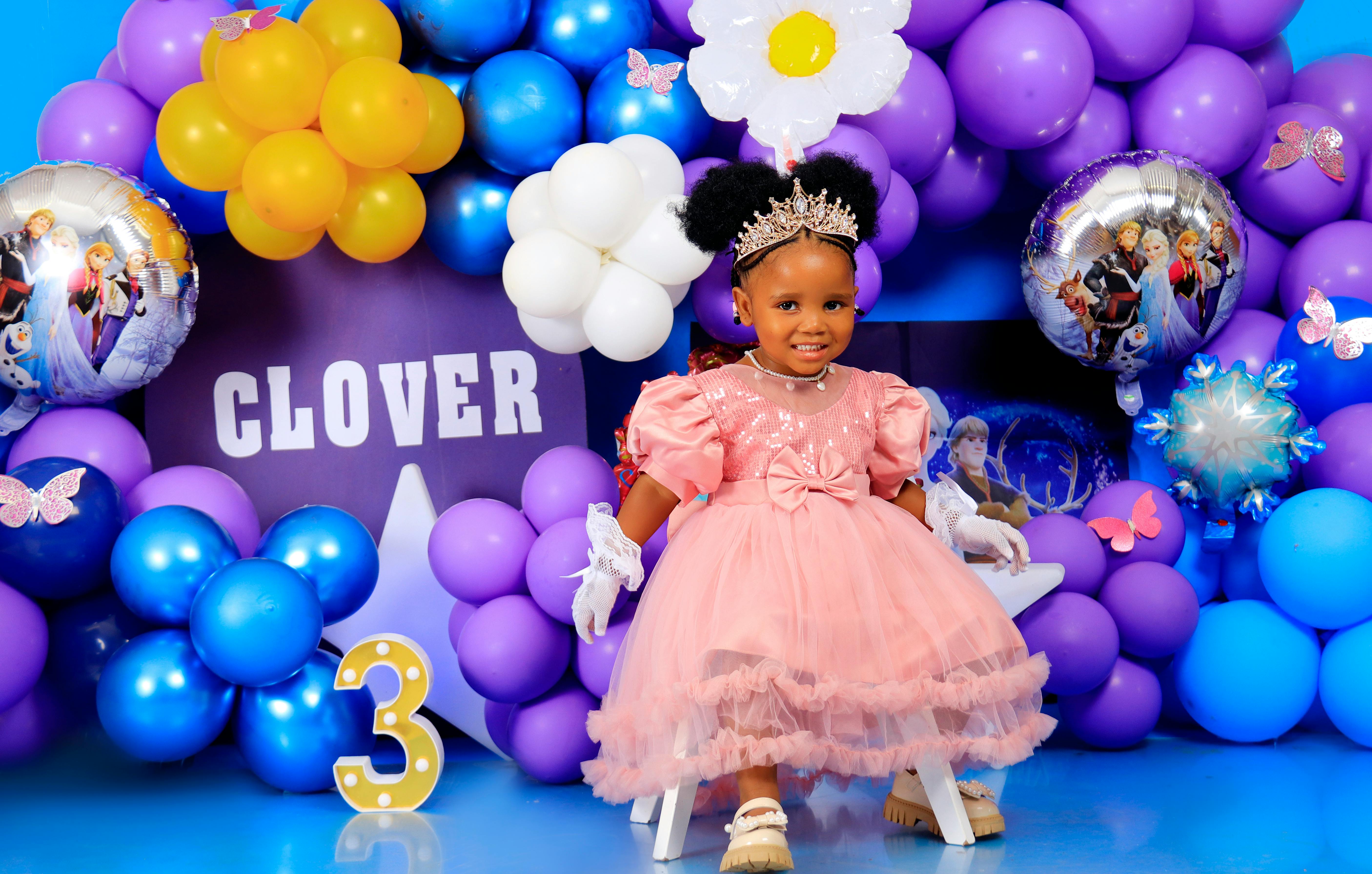 A joyful child's birthday party with vibrant decorations and balloons.