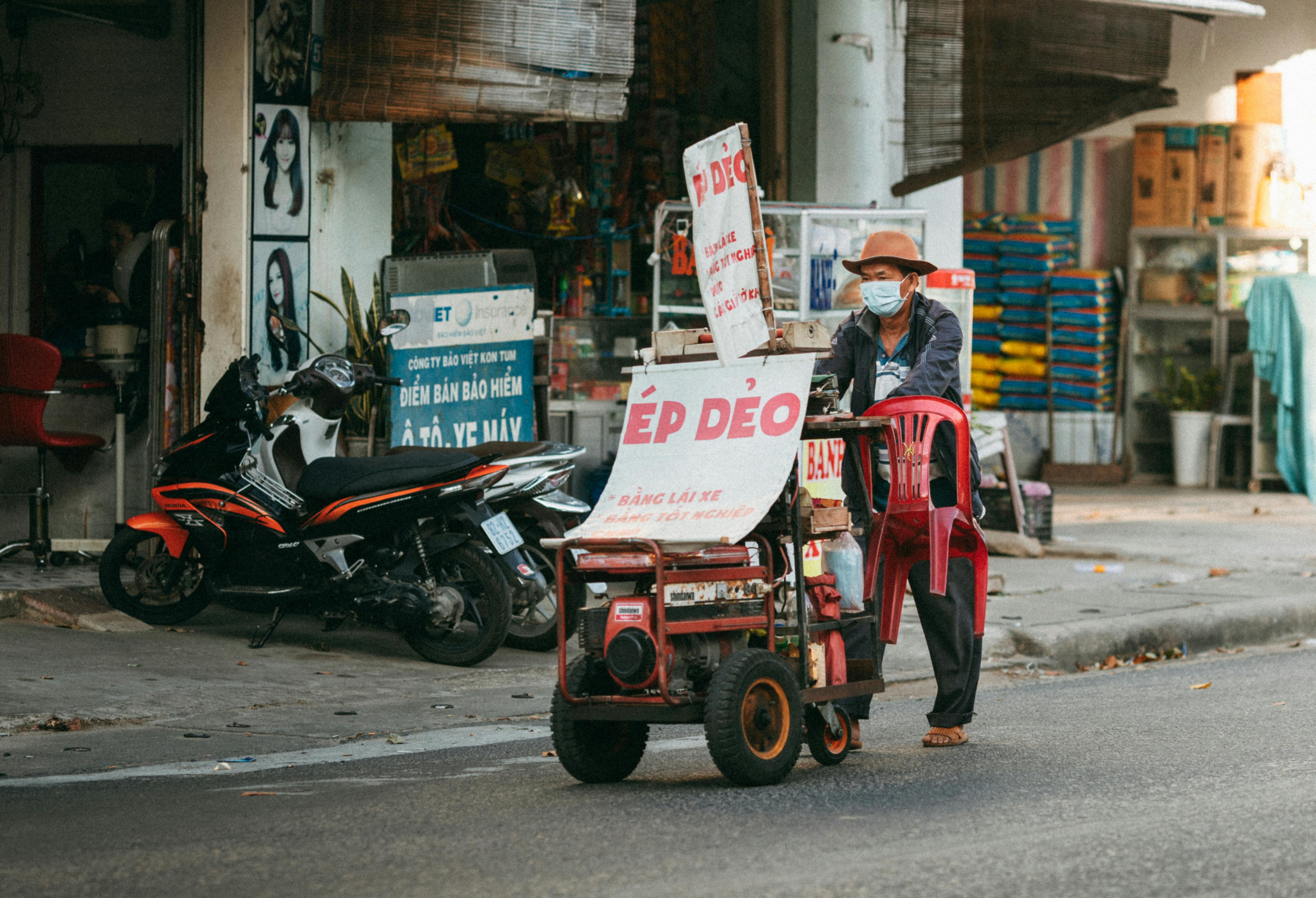 Mobility scooter with protective canopy and UV shielding accessories
