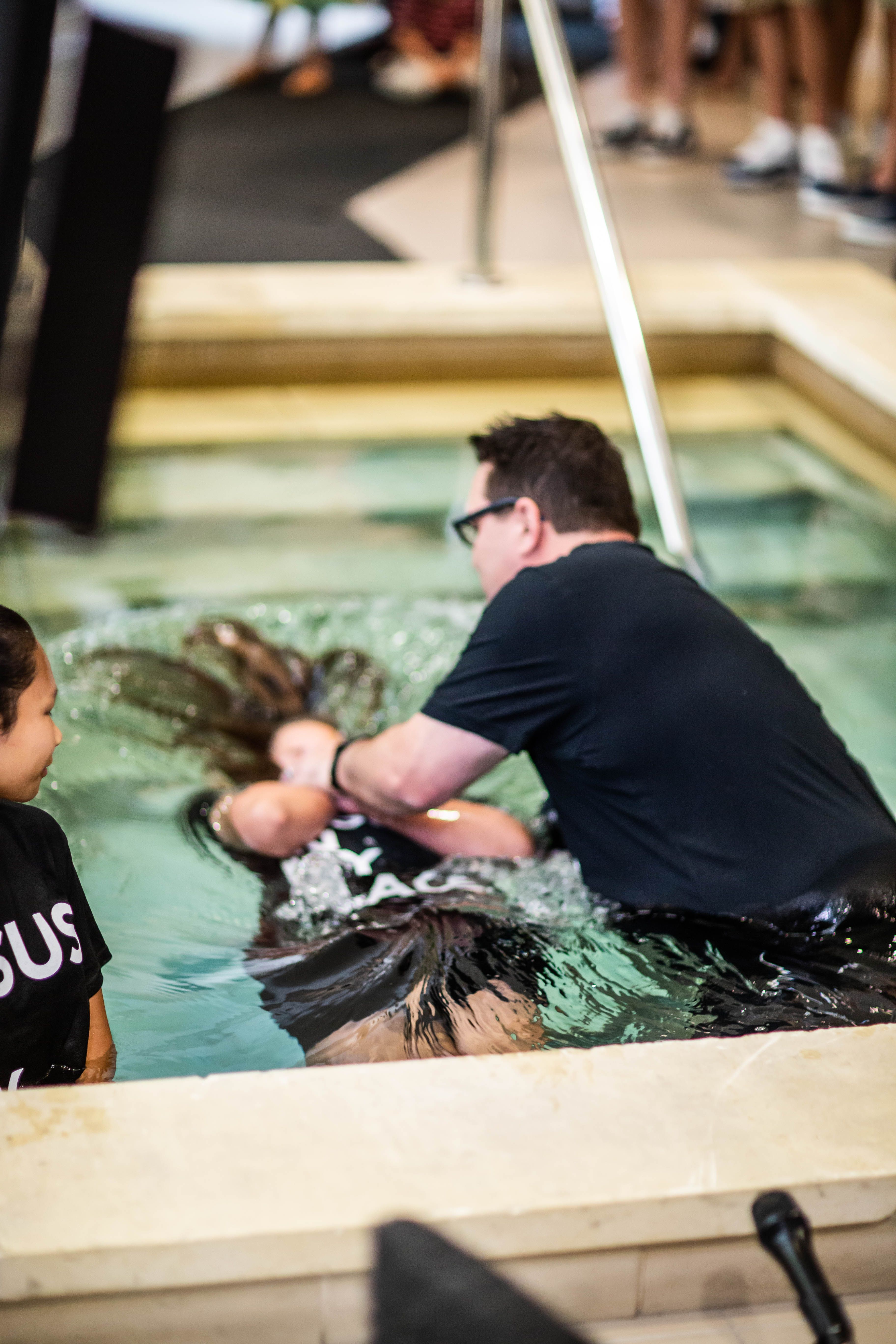 Baptism Ceremony in Church Pool Captured Candidly · Free Stock Photo