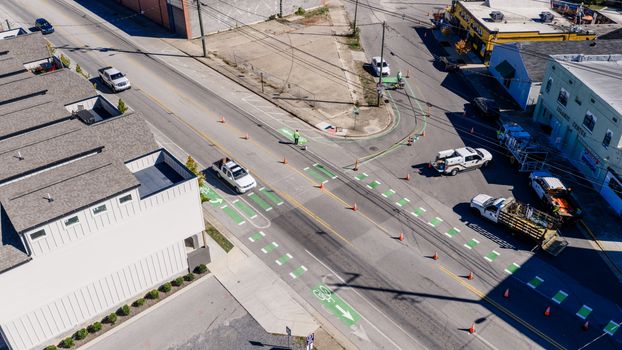 Aerial drone view highlighting a bike lane and ongoing road construction in Chattanooga, Tennessee.