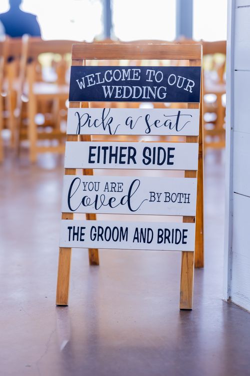 Free Indoor wedding sign with personalized welcome message for guests at a reception. Stock Photo