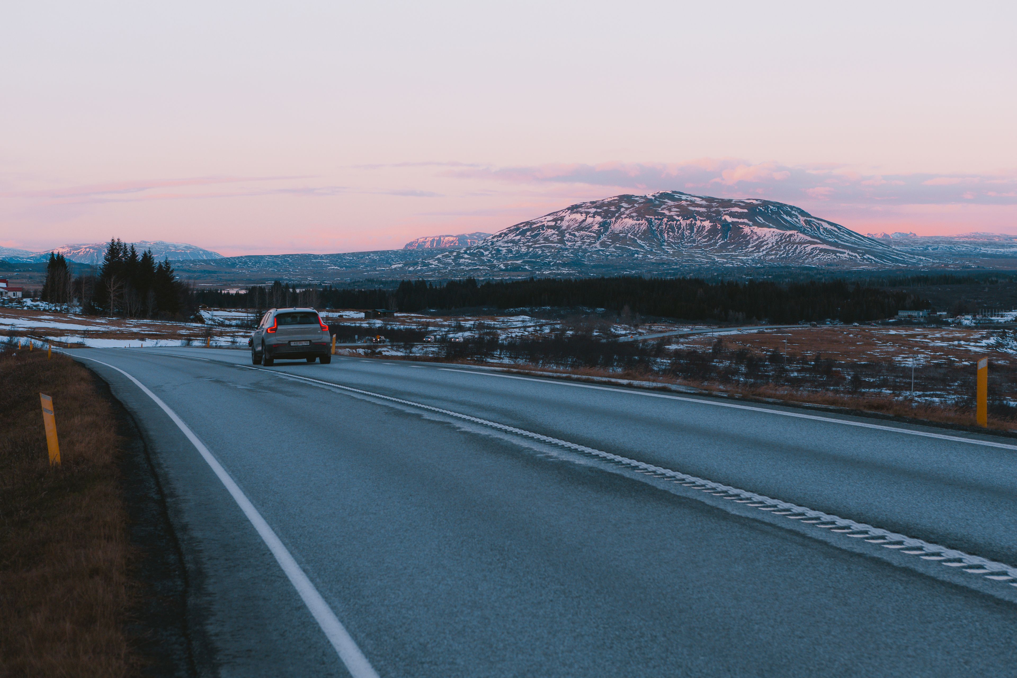A chauffeur-driven journey at dusk