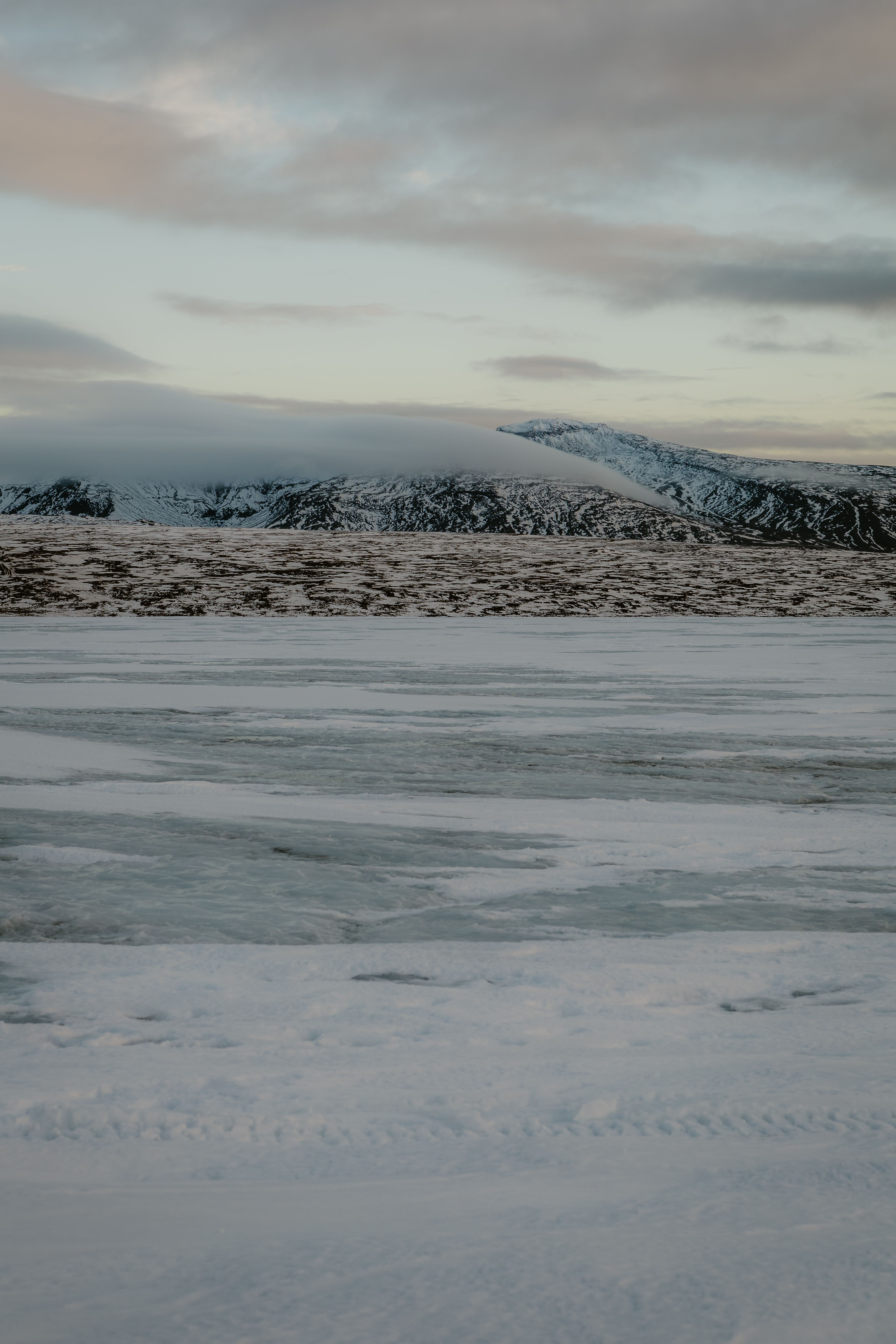 Serene Winter Landscape with Snowy Mountains · Free Stock Photo