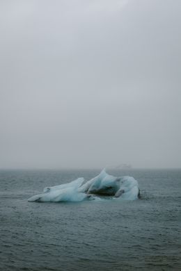 Now playing artwork: a lone iceberg — photo by Andreas Ebner on Pexels
