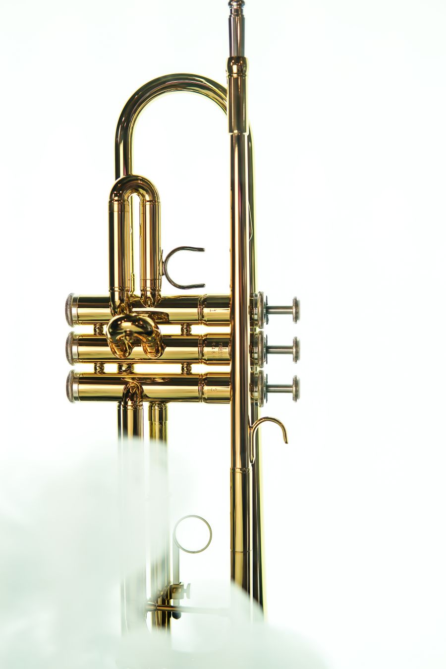 A gold trumpet on white
