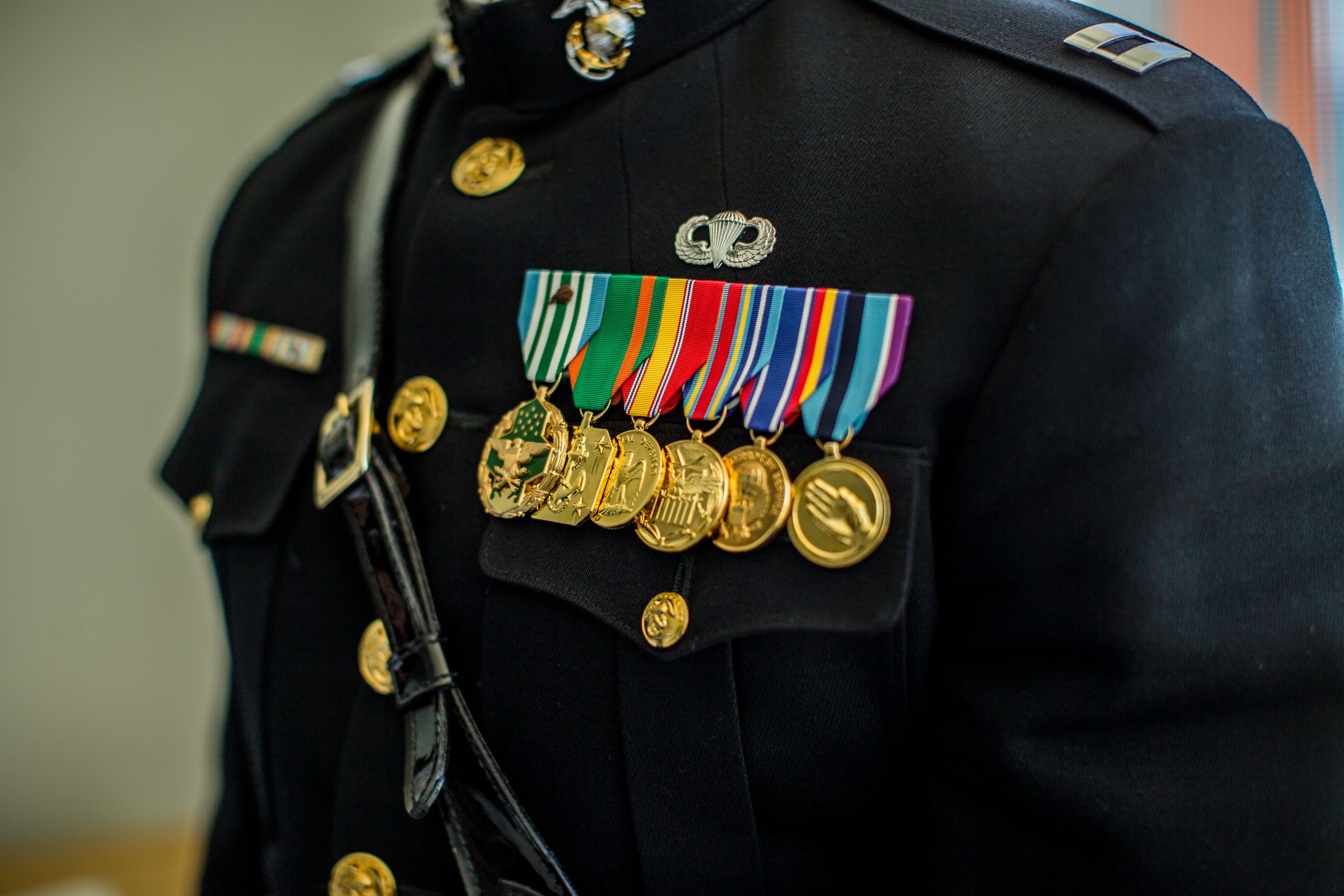 Decorated US military officer uniform showcasing medals and service badges