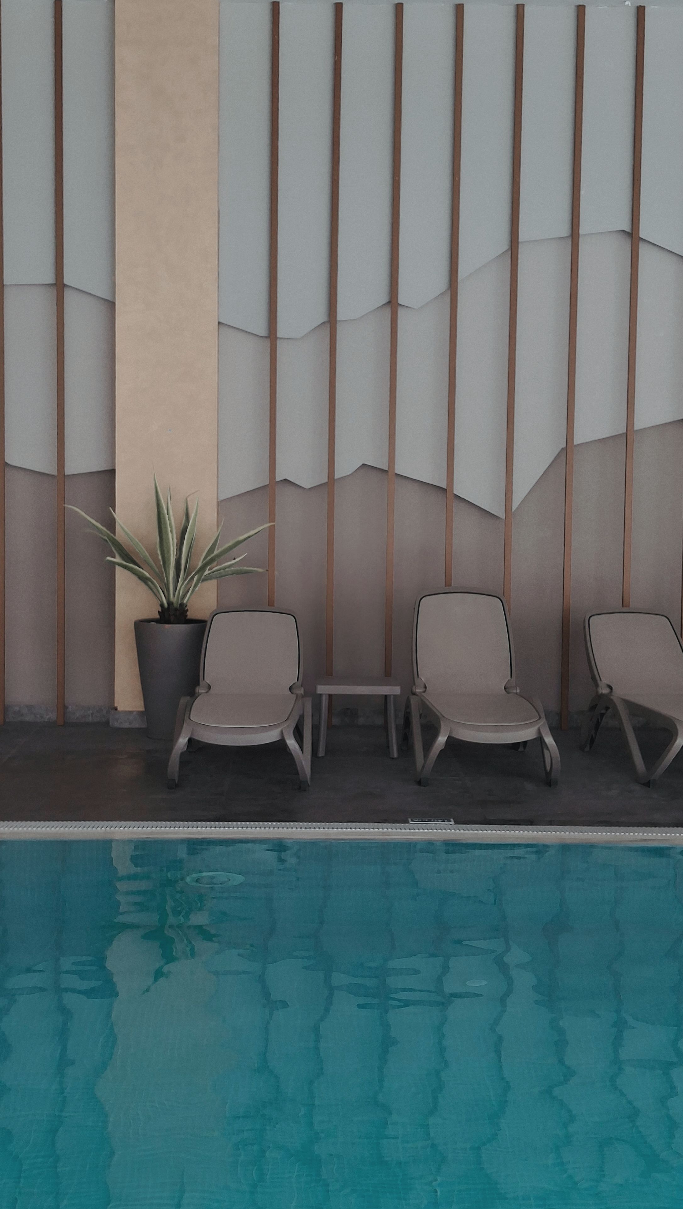 Poolside Serenity at Modern Indoor Resort · Free Stock Photo