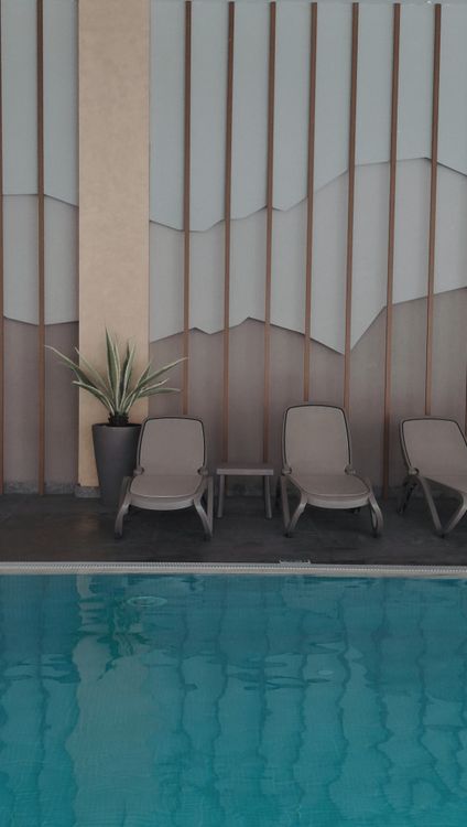 Poolside Serenity at Modern Indoor Resort · Free Stock Photo