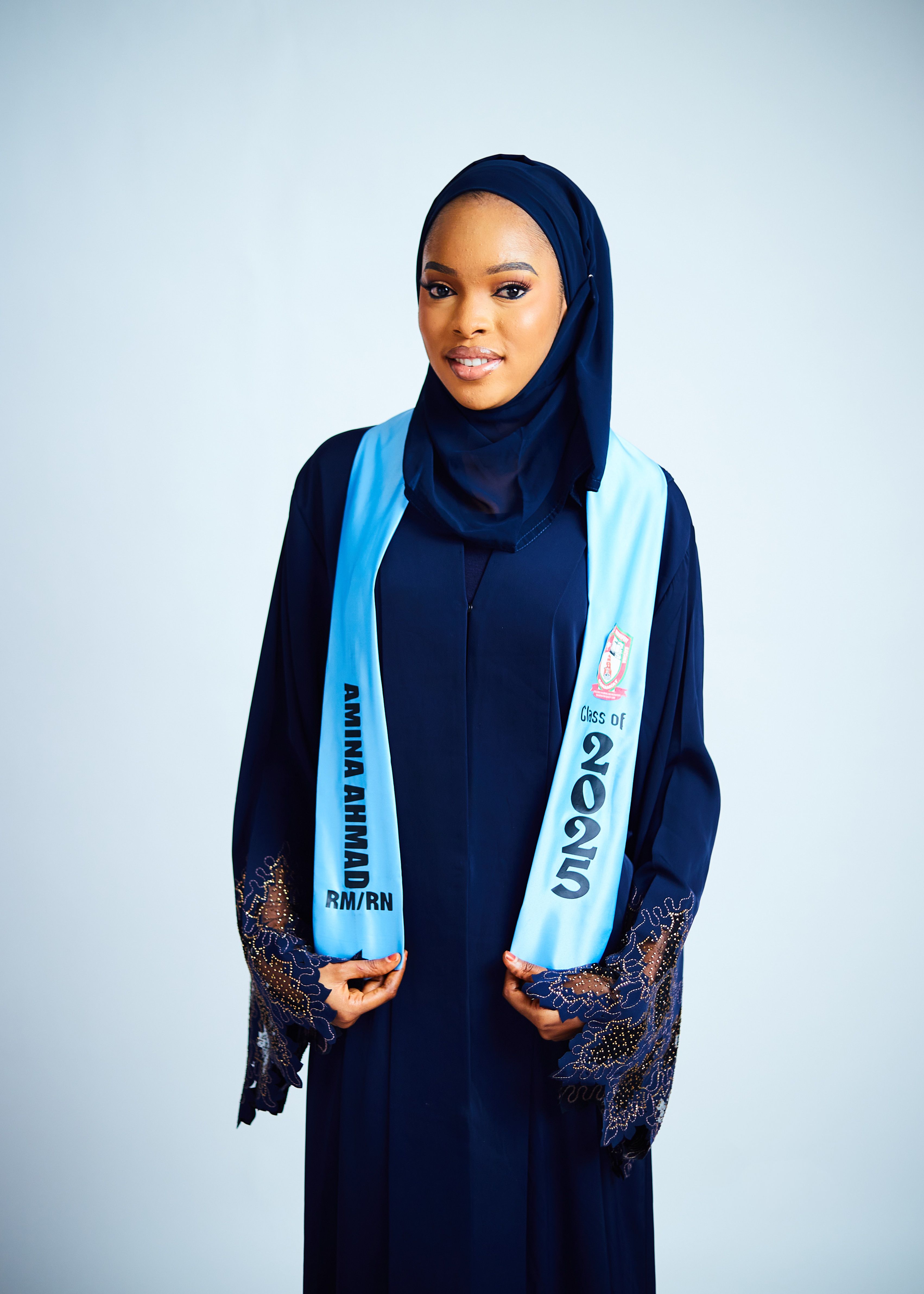 Graduate Muslim Woman in Hijab with Class of 2025 Sash Free Stock Photo Graduate Muslim Woman in Hijab with Class of 2025 Sash Free Stock Photo