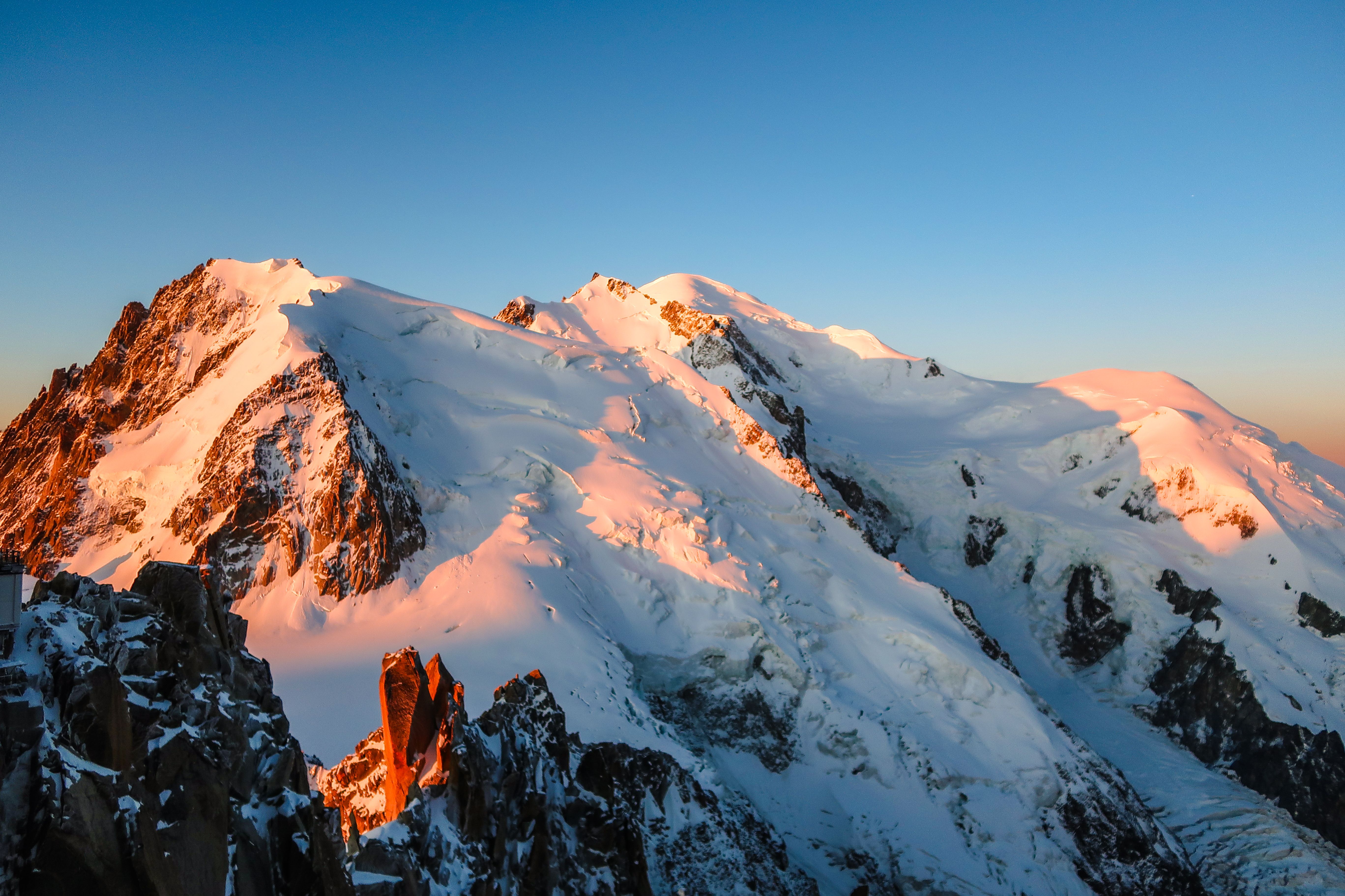 Breathtaking Sunlit Peaks of Mont Blanc at Sunset · Free Stock Photo