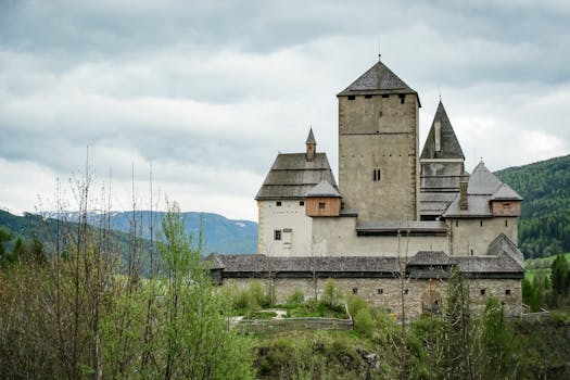 Majestic view of Mauterndorf Castle surrounded by lush greenery in Salzburg, Austria.