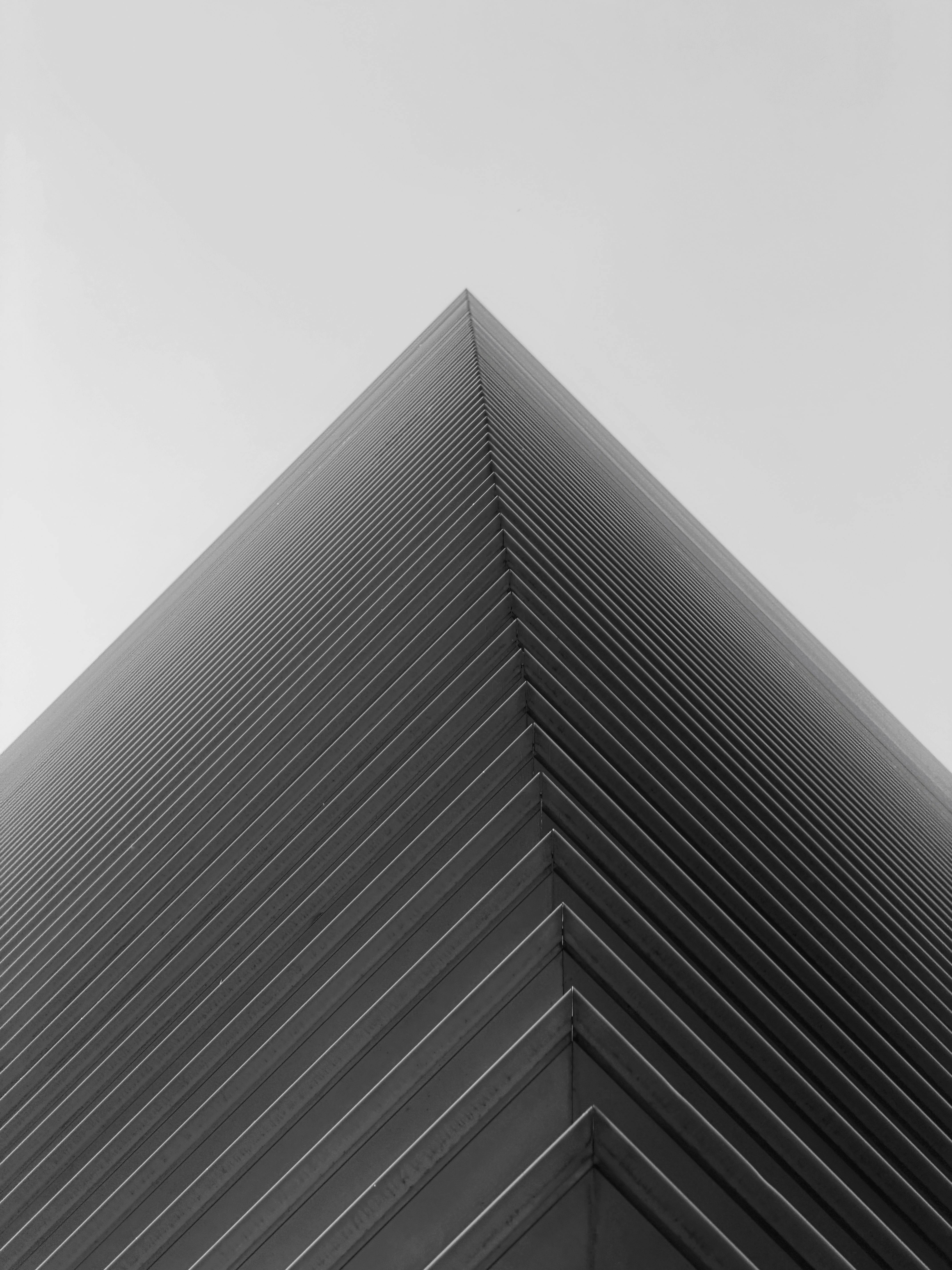 Free Monochrome image of a triangular architectural structure with high contrast lines. Stock Photo
