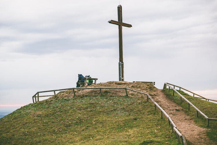 Cross On Hill With Fence