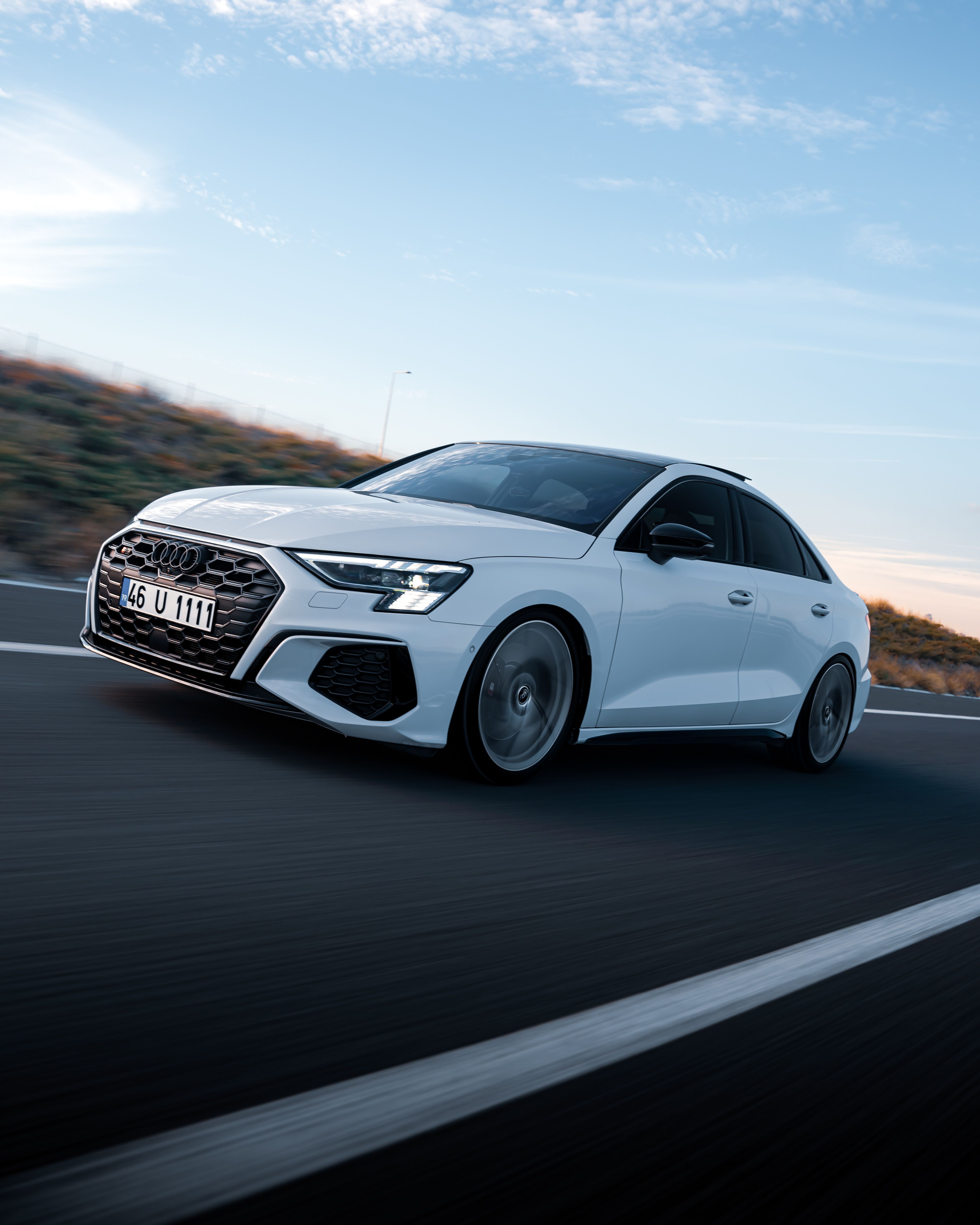 Sleek White Car Driving on a Highway in Türkiye · Free Stock Photo